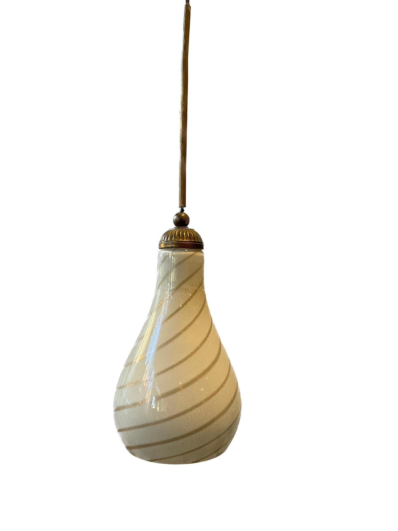1960s Murano gold and off white glass pendant with brass rod.