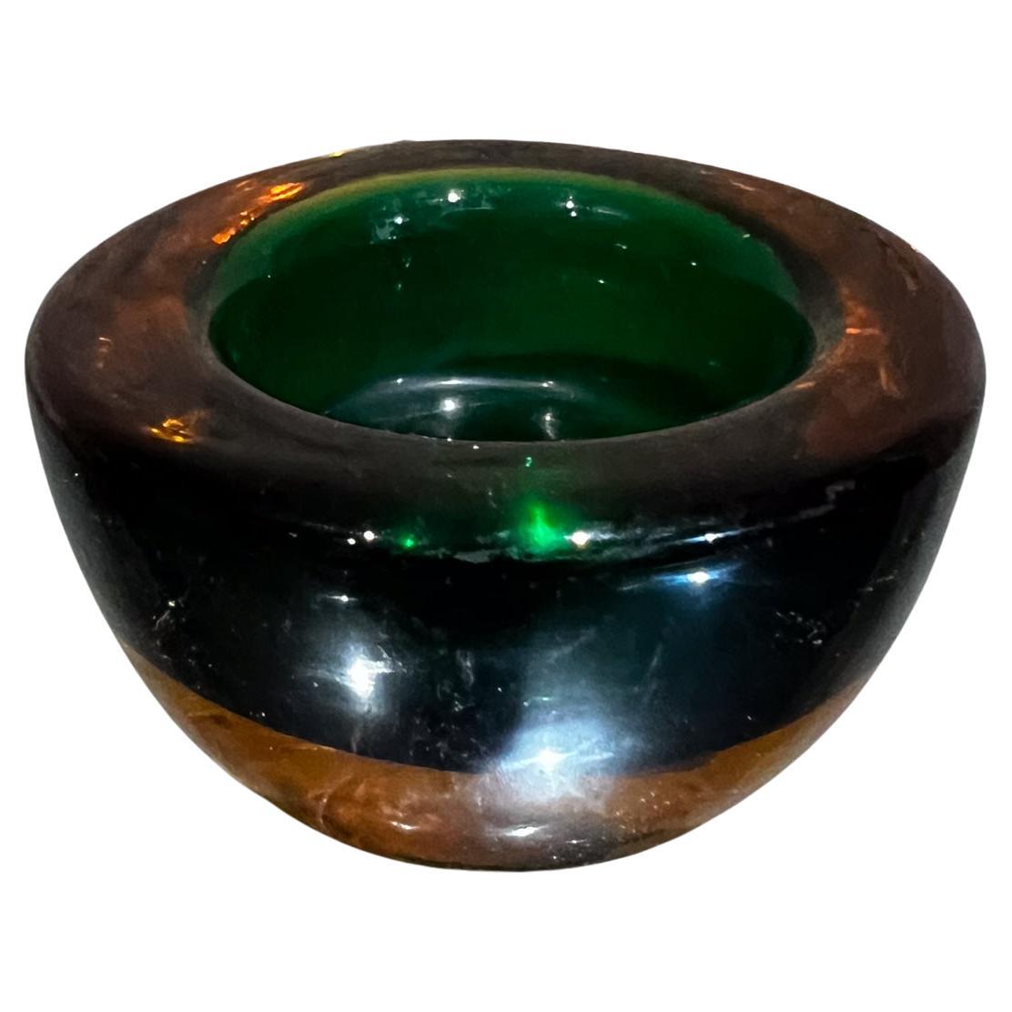 1960s Murano Green and Amber Sommerso Art Glass Votive Candle Holder
1.5 tall x 2.75 diameter
Preowned vintage condition.
Refer to all images.

