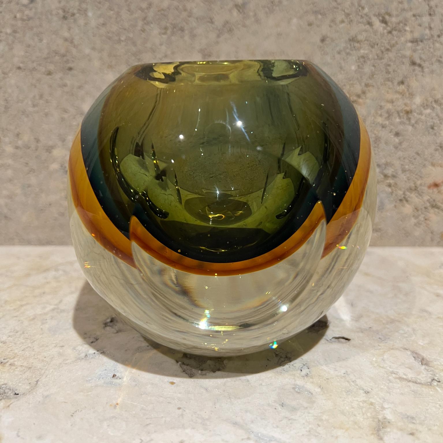 1960s Sommerso Murano Art Glass Green Votive Candle Holder
short vase or paperweight
Unmarked. No label remains.
4.25 h x 4 x 4
Original vintage condition
refer to images