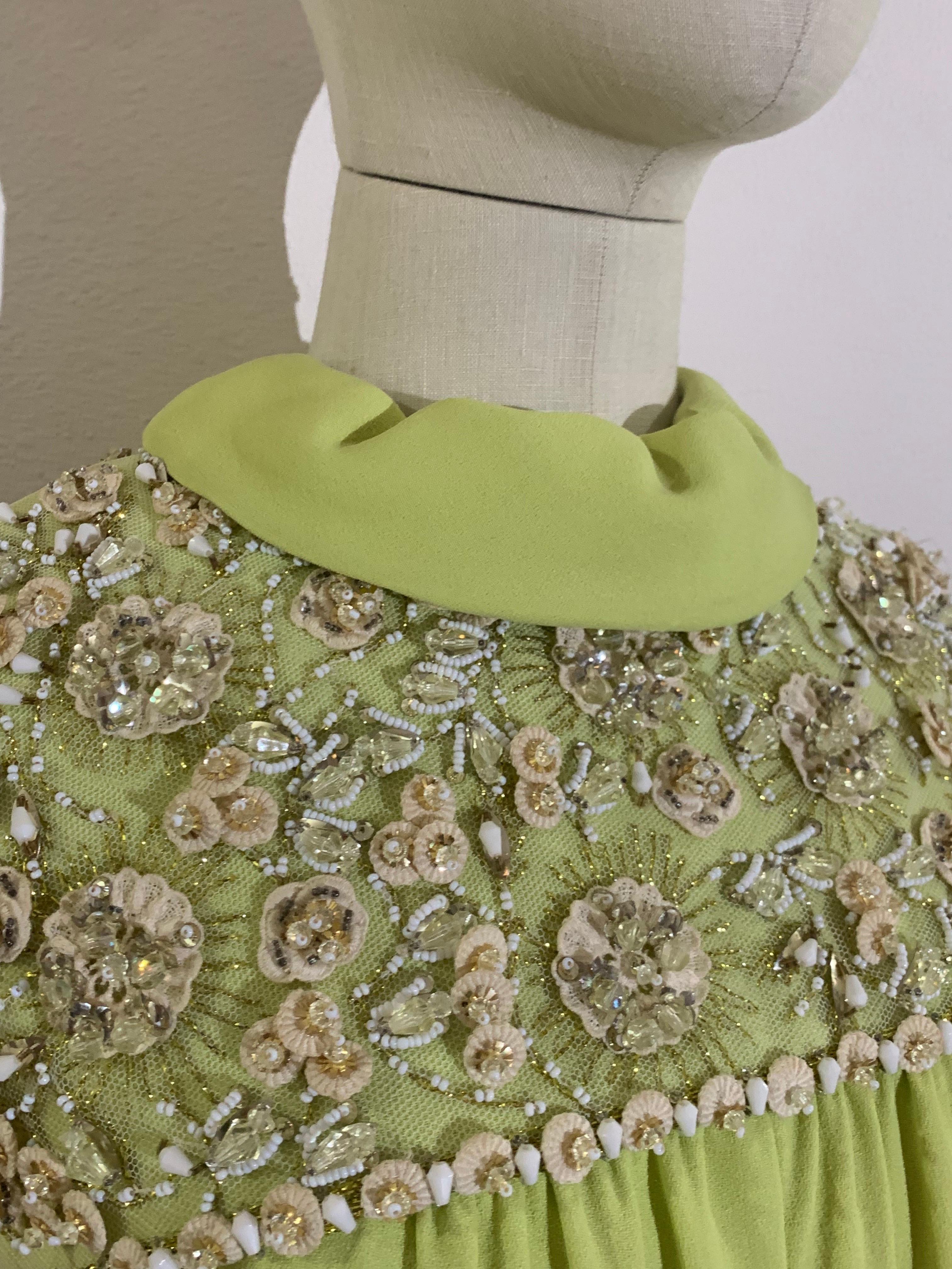 1960s Nan Duskin Chartreuse Green Silk Crepe A-LIne Mini Dress w Beaded Shoulders: Sleeveless with a rolled collar neckline, and beautiful white floral beadwork and rhinestones on netting. Demure gathering at center bustline. Fully lined. Back