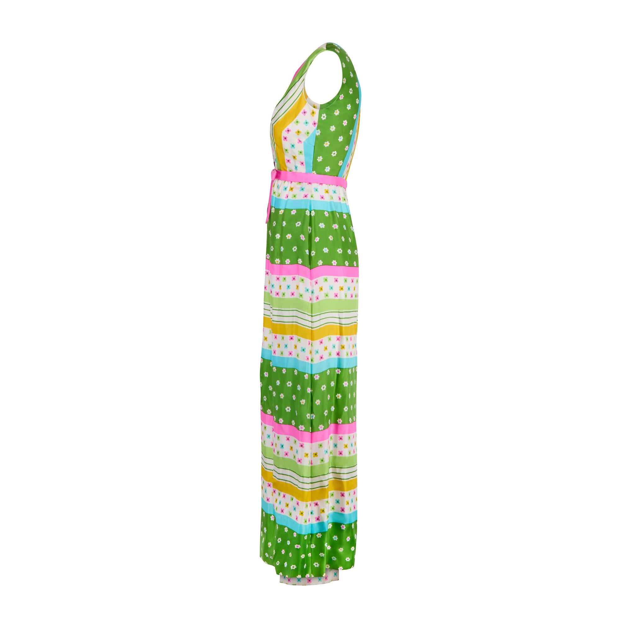 This playful and vibrant maxi dress and trousers ensemble was made by high-end American designer and manufacturer Nat Kaplan and retailed in San Francesco's premier department store I. Magnin & Co in the late 1960s to early 1970s. 

The top is
