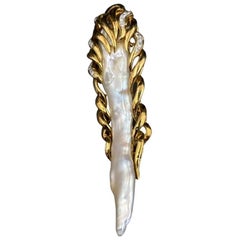 1960s Natural Long Baroque Pearl Pin Featuring a Natural Pearl, Set in 18K Gold