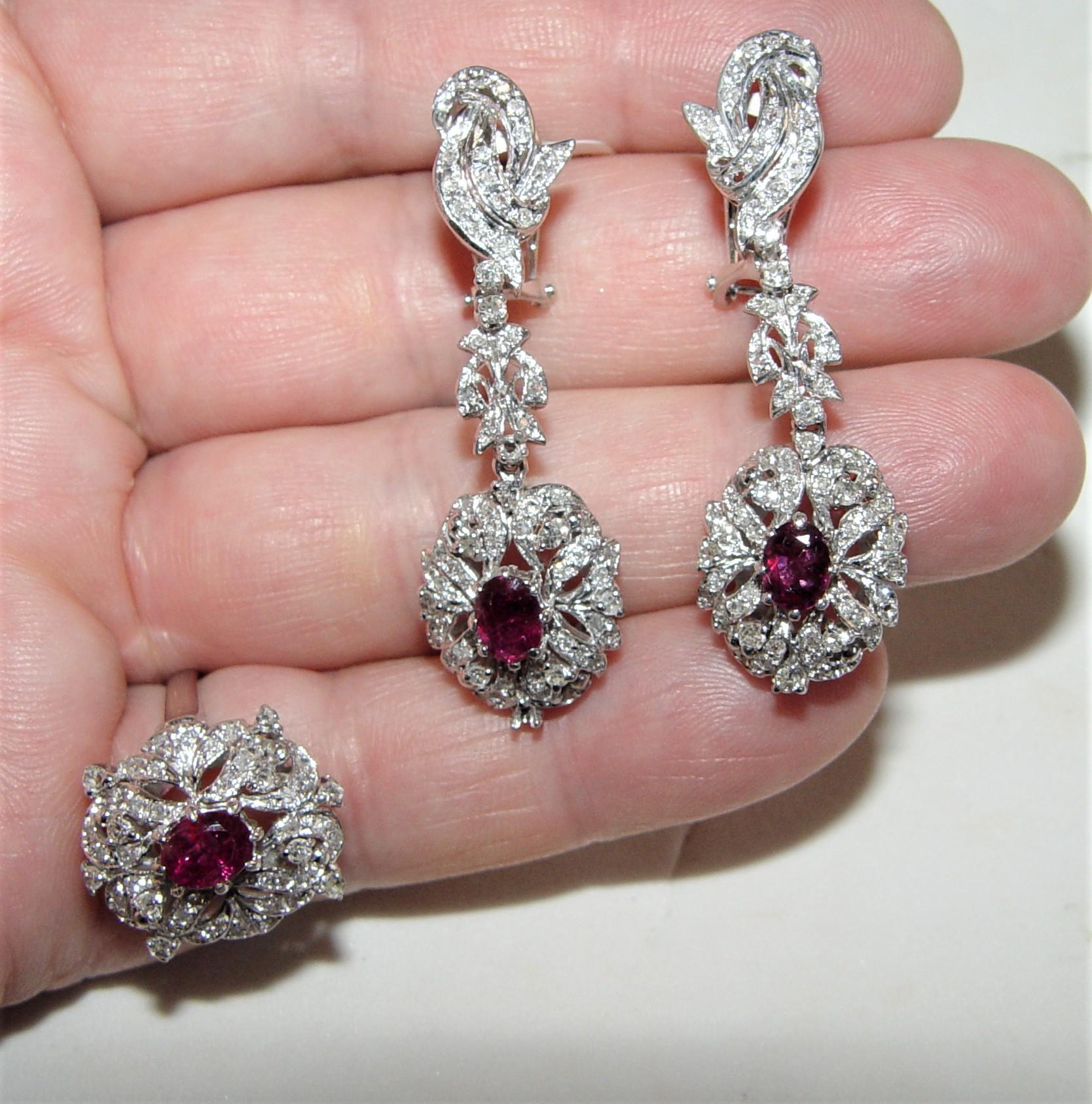 Beautiful Art Deco style filigree earrings/ring set most likely South American reproduction. Ring and earrings encrusted with single cut natural diamonds - we estimate 1.50CT total weight (measuring from 1.5 to 2.0MM in diameter. H-I in color SI1-I1