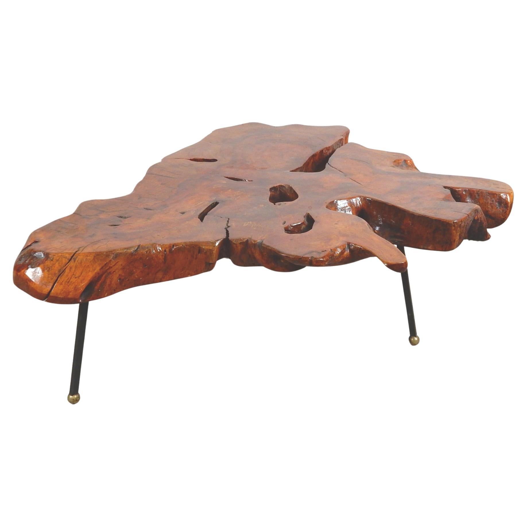 Huge slab of natural Sabino burl wood supported on massive wrought iron legs with large solid bronze ball feet.
Amazing grain and coloration. Circa 1960s, Mexico.
Just about flawless condition with no breaks or repairs.
We have a matching pair of