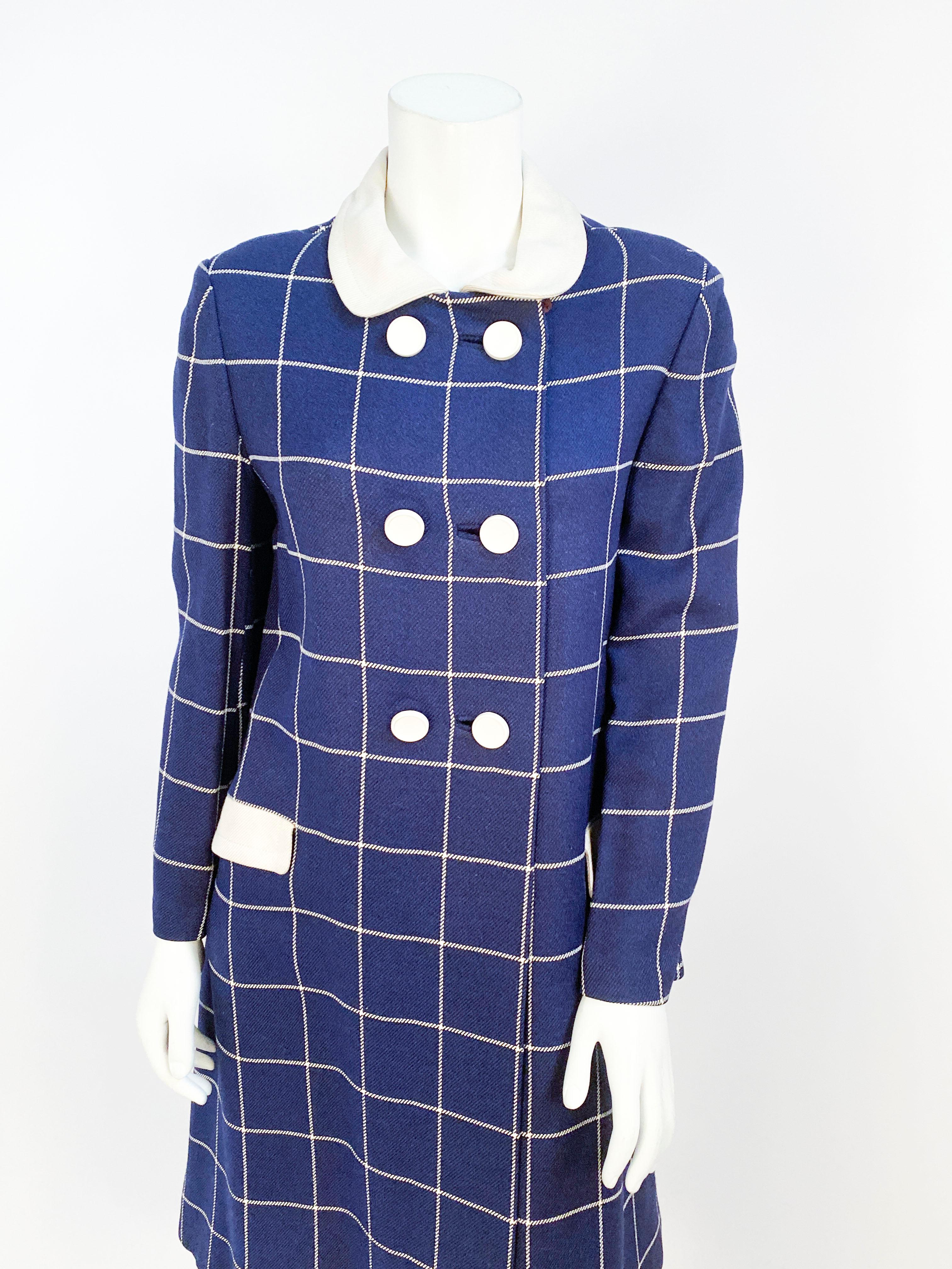 1960s Navy wool windowpane plaid coat with a contrast cream collar and pocket covers finished with bold white buttons.