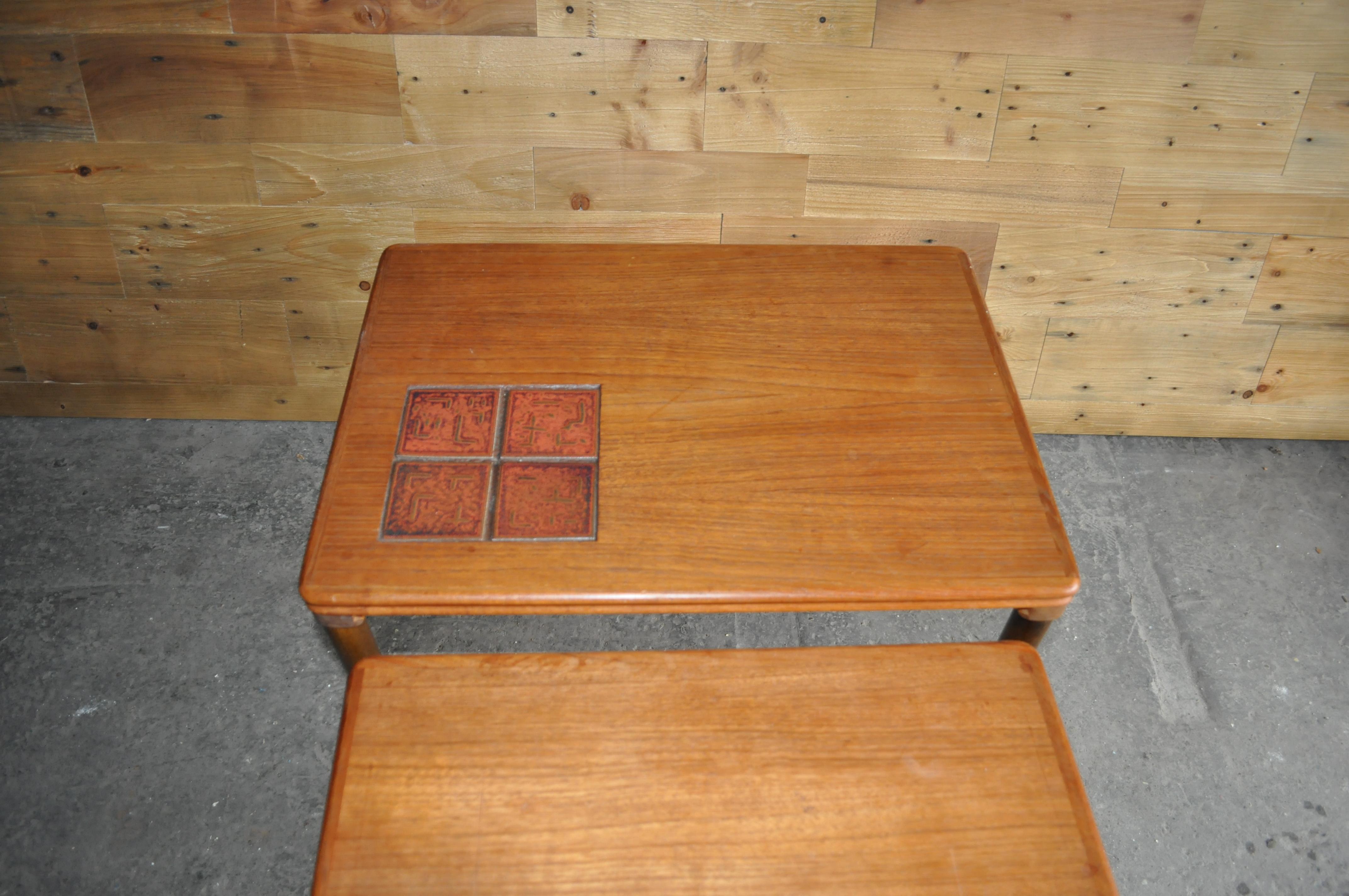 Mobler nest with German tile.
A lovely nest of 1960s Danish coffee tables. With beautiful teak veneer and a single tile in the top table.
Size: 55 x 40 x 50
47 x 40 x 47
40 x 40 x 45.