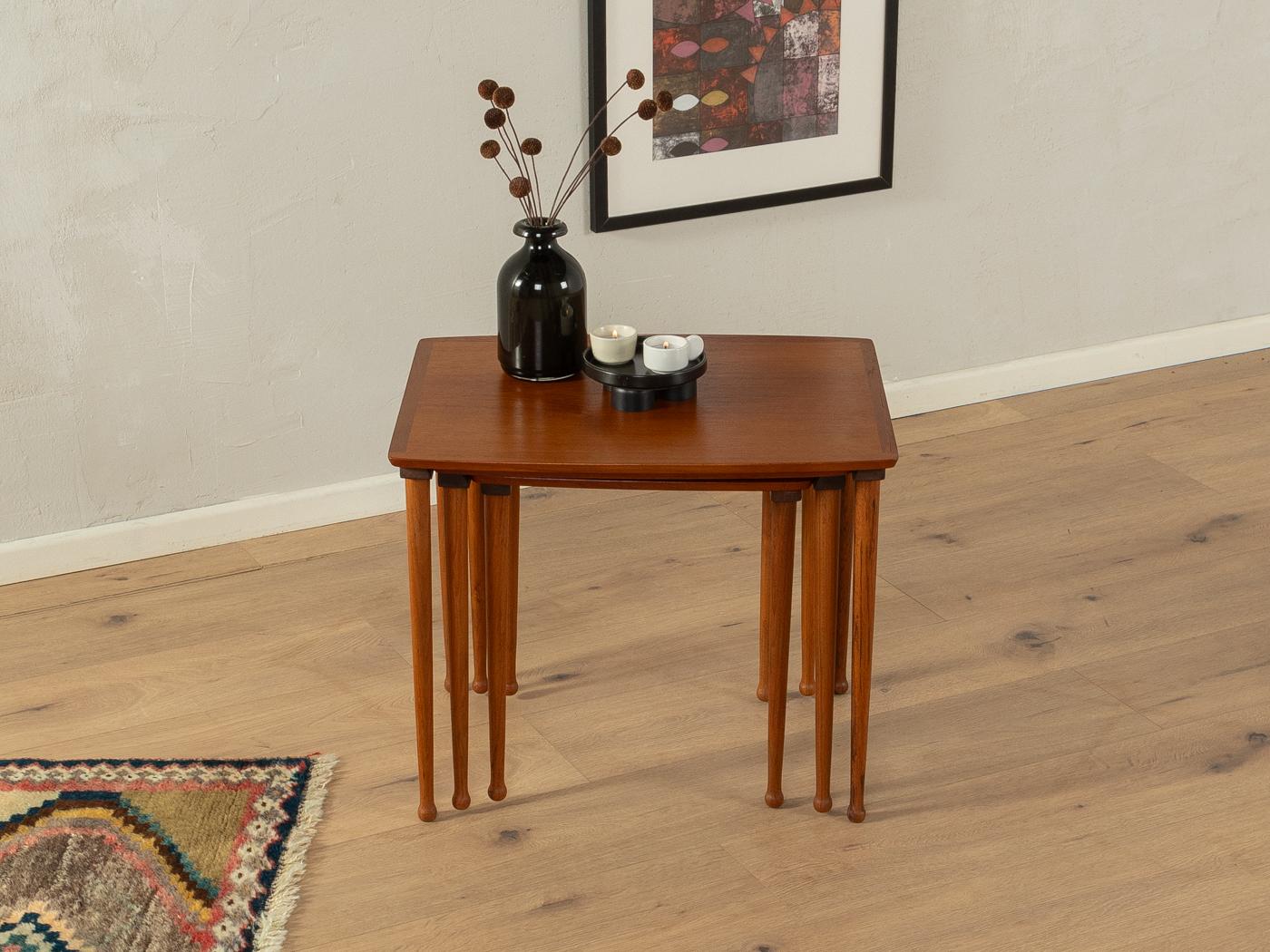 Rare nesting tables from the 1960s. High-quality solid teak frame and table top in teak veneer with solid wood edges.

Quality Features:
    very good workmanship
    high-quality materials
    solid wood edges
    Made in Denmark, manufacturer: