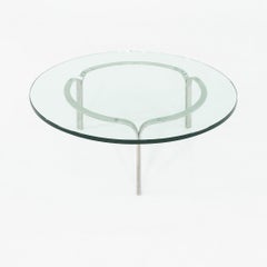 1960s Nicos Zographos Ribbon Table with 42 inch Glass Top and Stainless Base