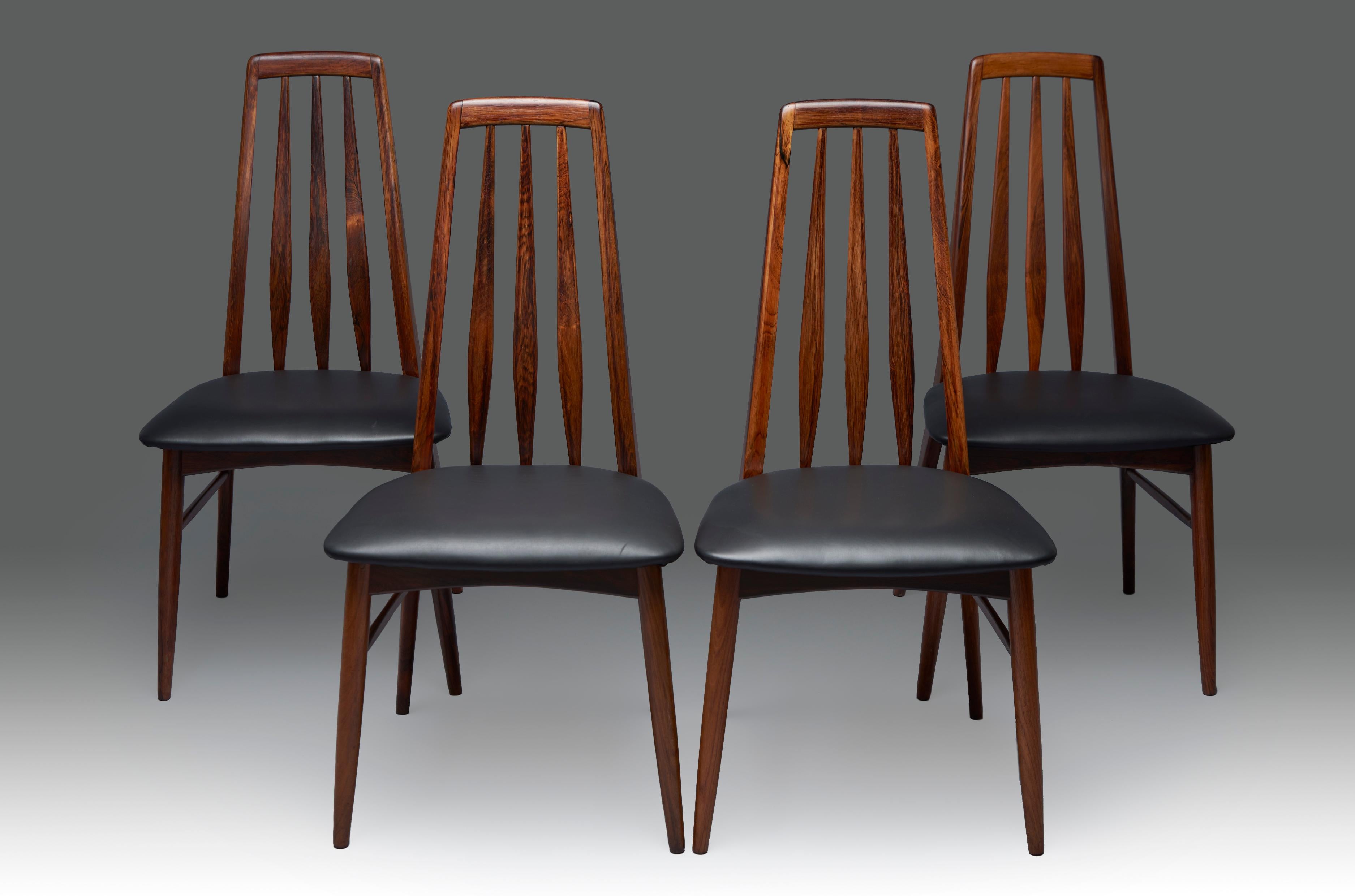 Set of four Niels Koefoed “EVA” rosewood dining chairs for Koefoeds Hornslet. Denmark, 1960s.

Excellent vintage condition, with minor signs of usage. Completely restored and new black leather upholstery.
 