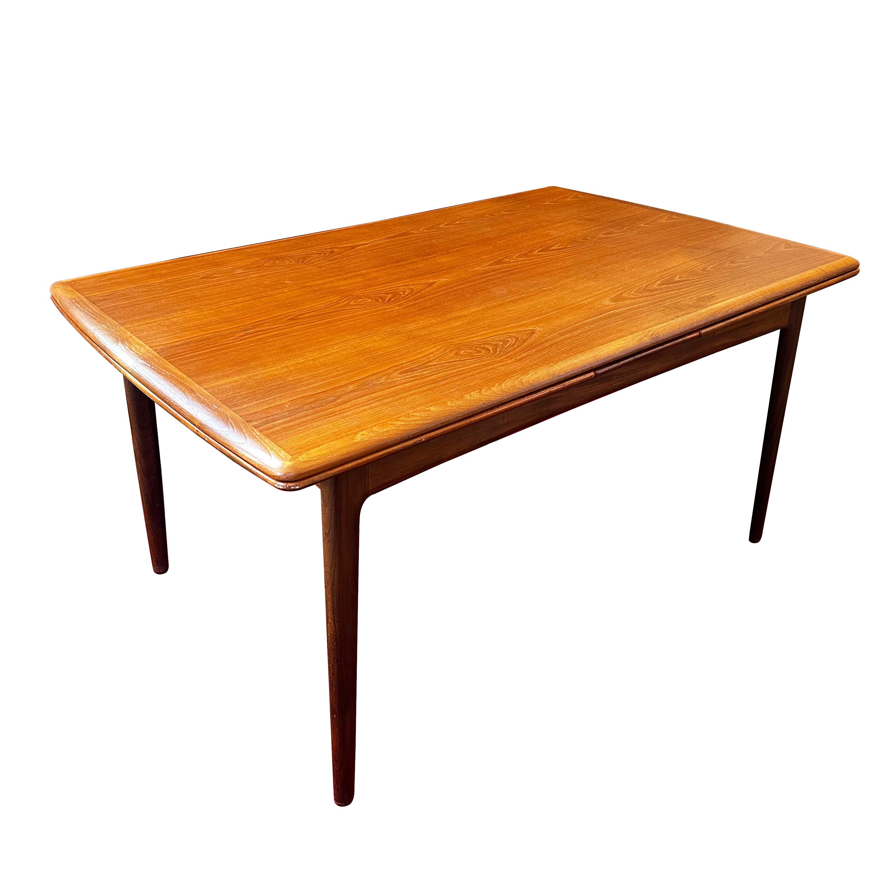 Designed by Niels Moller, this table exemplifies the clean lines and minimalist aesthetic that defined the Danish Modern design movement. Crafted from high-quality teak, this table features a sleek, rectangular top that extends from 56” to 100” with