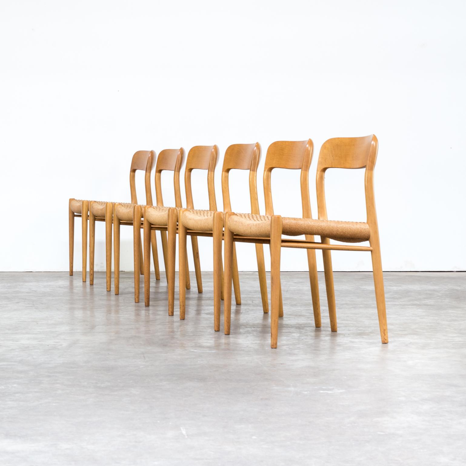 One set of six Niels O. Møller model 75 dining chairs for J.L. Møller. Very good condition consistent with age and use.