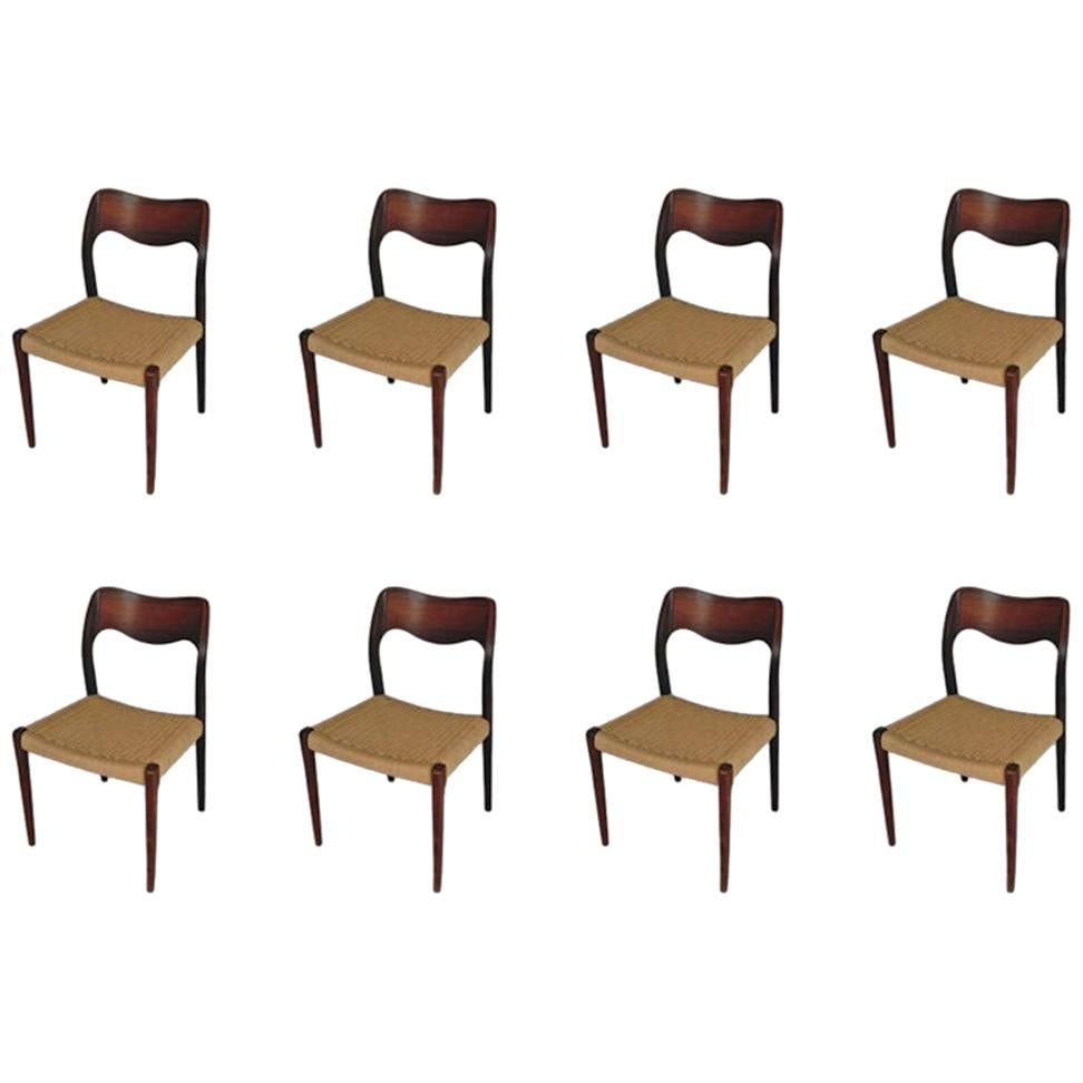 1960s Niels Otto Møller Eight Rosewood Dining Chairs with New Paper Cord Seats