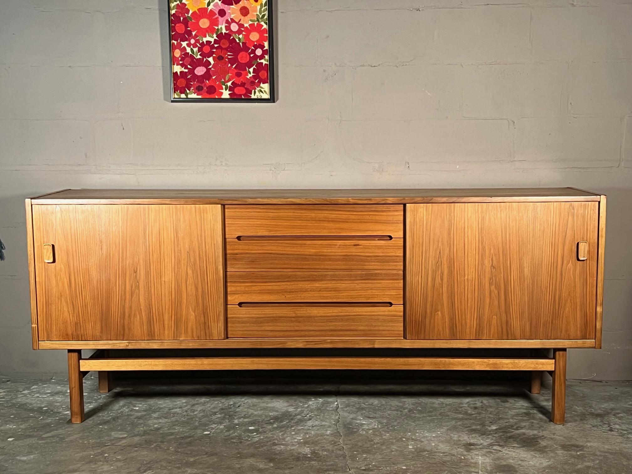 A Classic 1960's teak credenza by Nils Jonsson for Troeds Bjarnum, Sweden. Purchased from original owners, in very good condition, with nice patina.