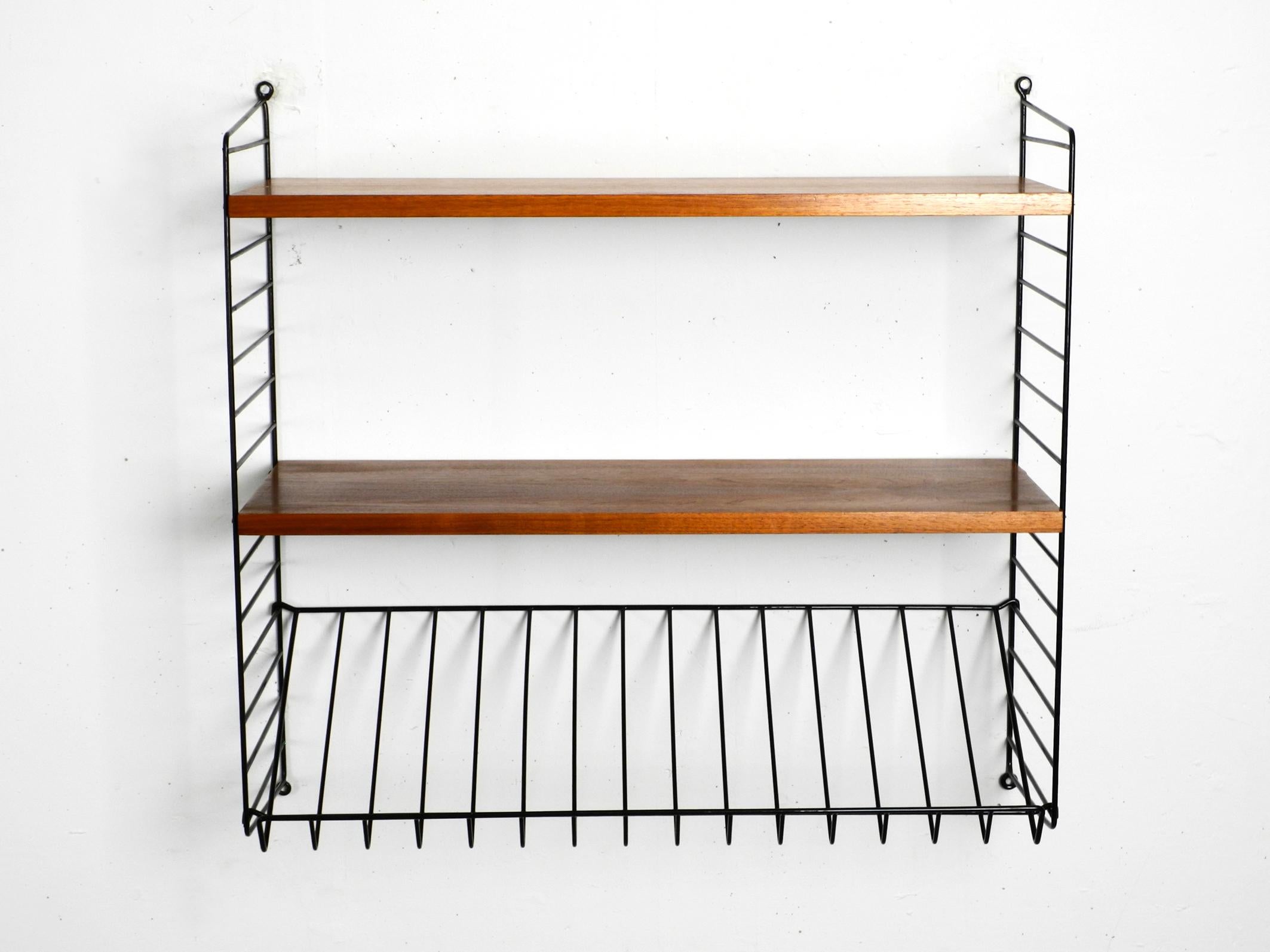Mid-Century Modern 1960s Nisse Strinning teak string shelf with one magazine rack and two shelves