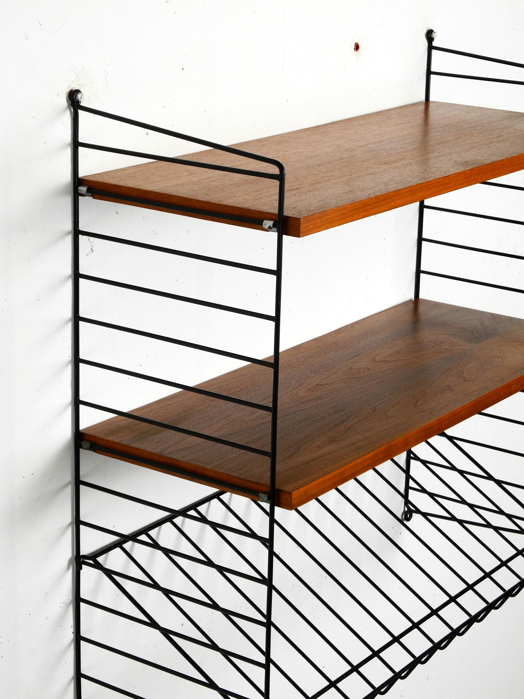 1960s Nisse Strinning teak string shelf with one magazine rack and two shelves 1