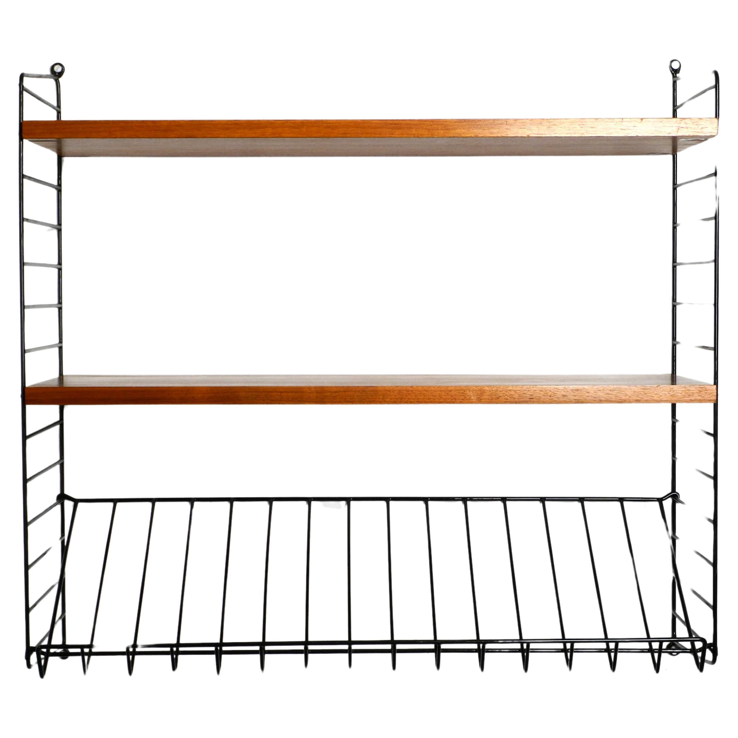 1960s Nisse Strinning teak string shelf with one magazine rack and two shelves
