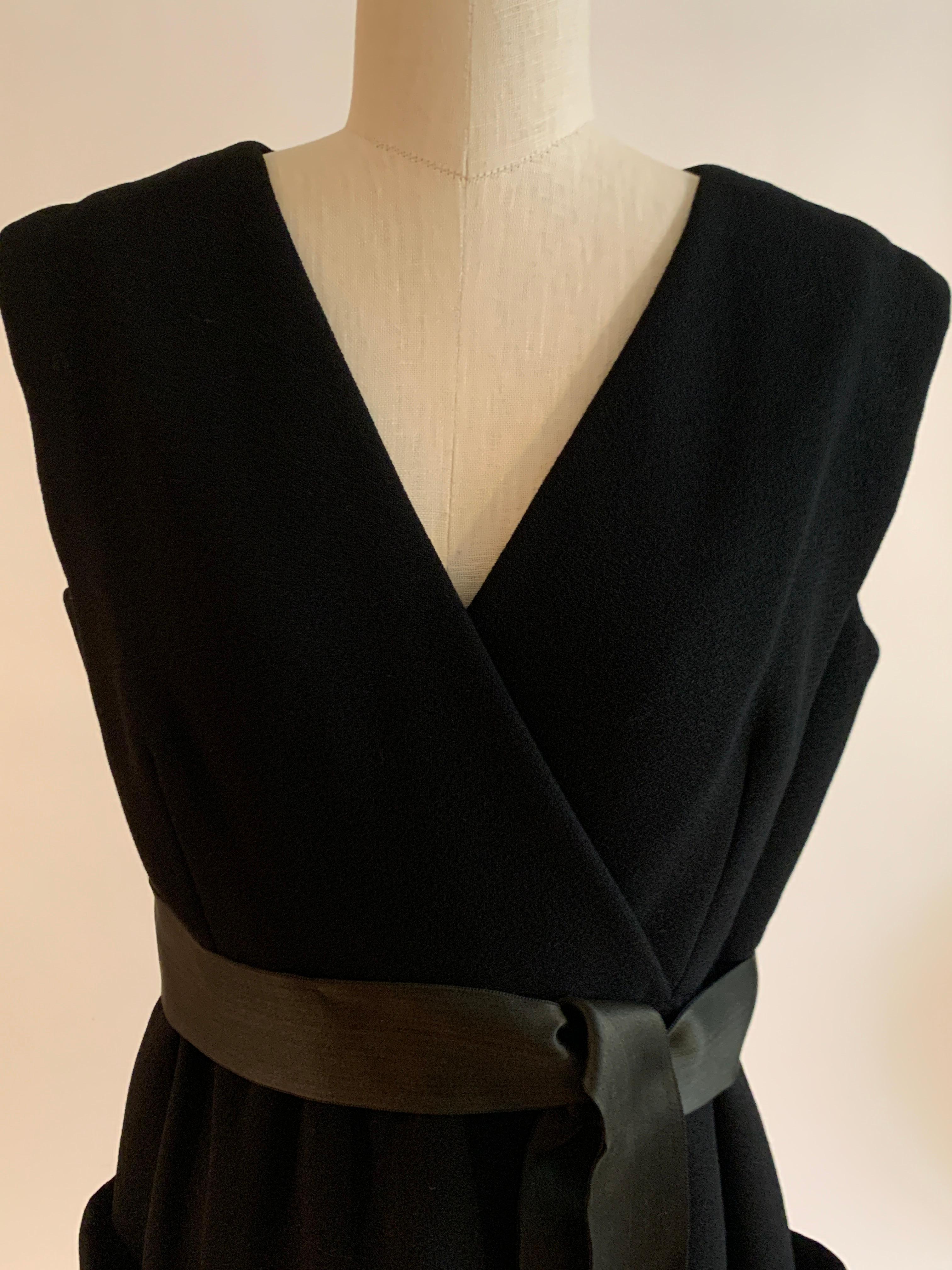1960s Norman Norell Black Shift Dress with Patch Pockets and Ribbon Belt In Good Condition In San Francisco, CA