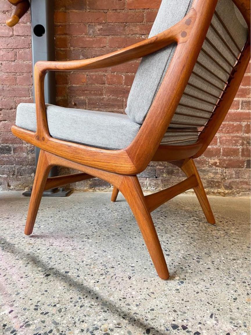 Introducing a stunning small-scale 1960s Norwegian easy chair, designed by the visionary Gerhard Berg for PI Langlo. This exceptional piece boasts distinctive 