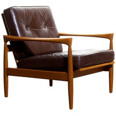 1960s, Oak and Brown Leather Lounge Chair by Erik Wörtz for Broderna Anderssons