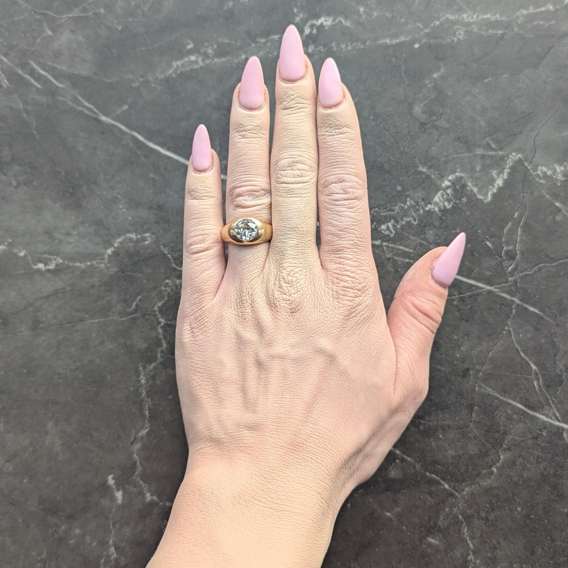 Centering an old European cut diamond weighing approximately 2.00 carats
K color with VS2 clarity - flush set in a bombé shaped surround
Completed by a tapered shank
Stamped for 14 karat gold
Circa: 1960s
Ring Size: 7 and sizable
Measures north to