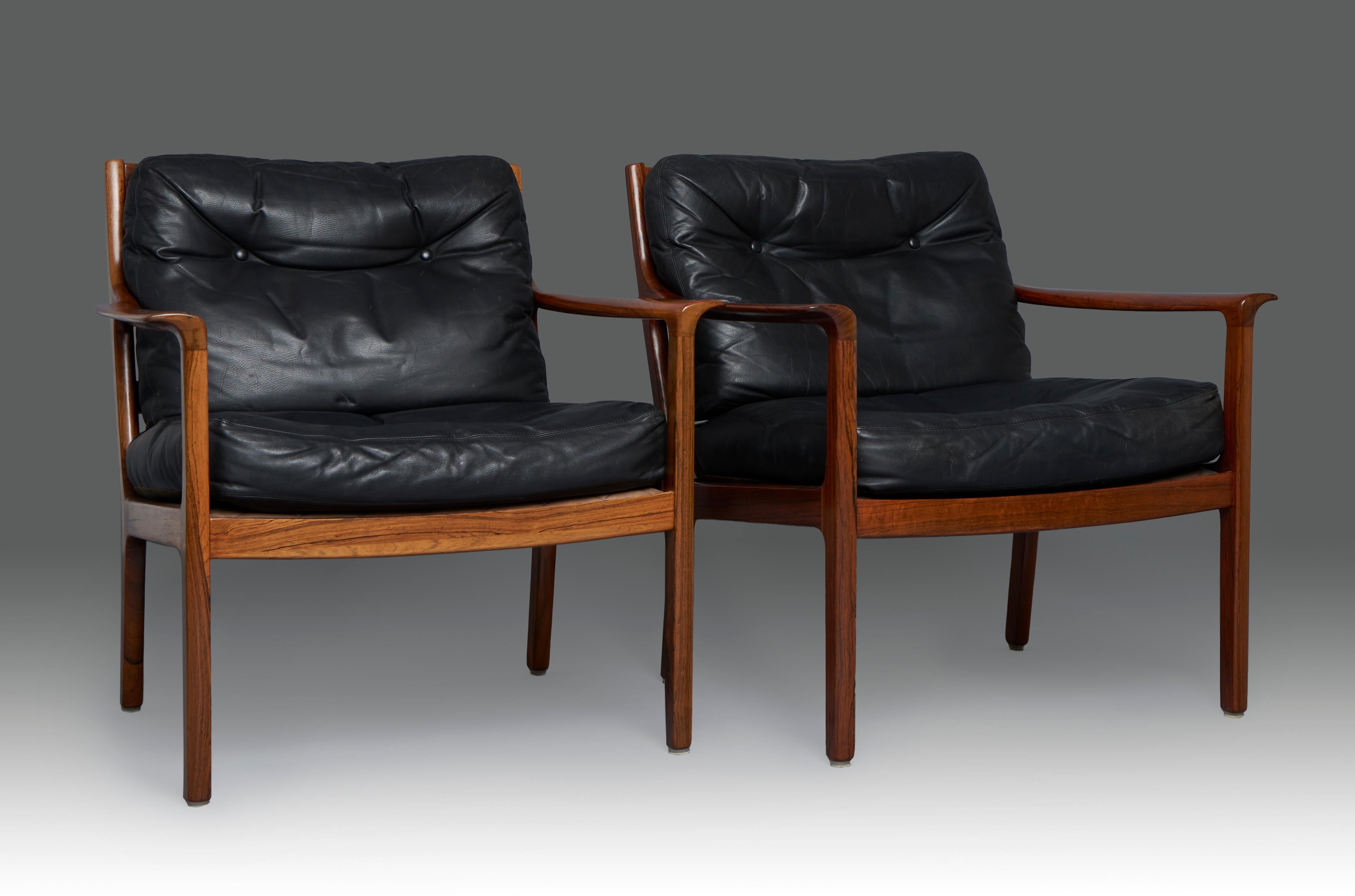 Pair of easy chairs in leather and rosewood designed by Ole Wanscher for P. Jeppesen. Denmark, 1960’s. magnificent restored state, original leather.