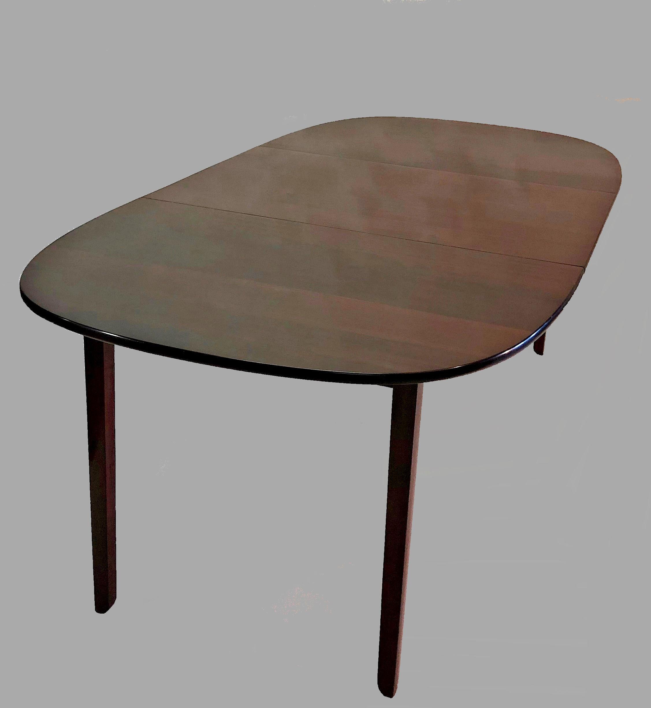 1960s Ole Wanscher restored expandable mahogany dining table by P. Jeppesen 

The light and elegant Ole Wanscher dining table has two two extra leaves so it can expand from W 145 cm. / 57.09 in. up to 245 cm. / 96.46 in.

The dining table is part of