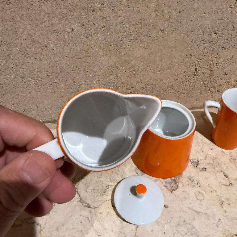 1960s Modernist Orange Sugar Creamer Set and Coffee Mug For Sale at 1stDibs