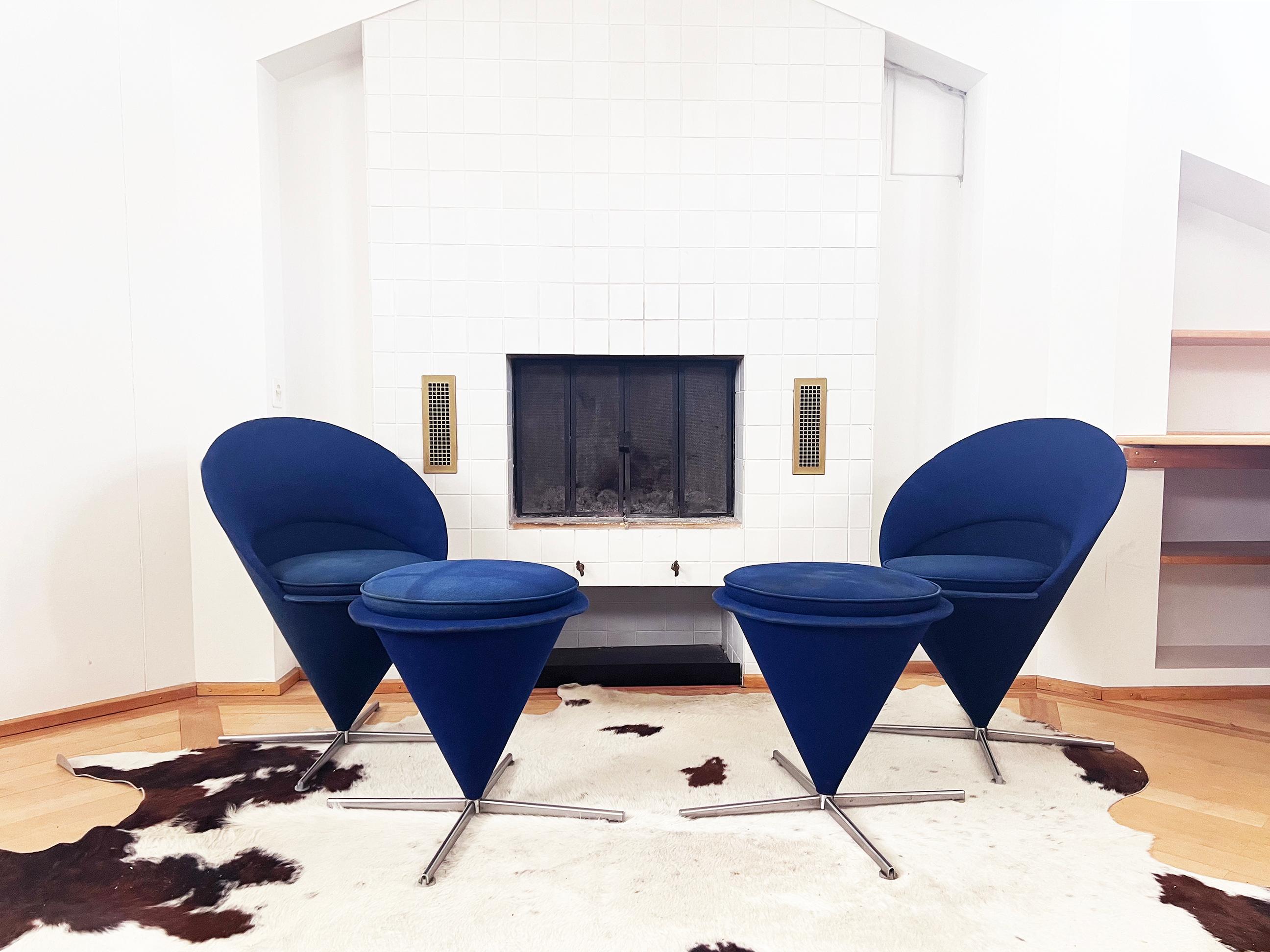 Original Verner Panton Cone Chair and Ottoman, produced by Vitra.  Beautiful set.

This is the iconic Verner Panton chair in the shape of a cone, upholstered in blue wool and featuring a swivel four-pass steel base with round acrylic feet. The model