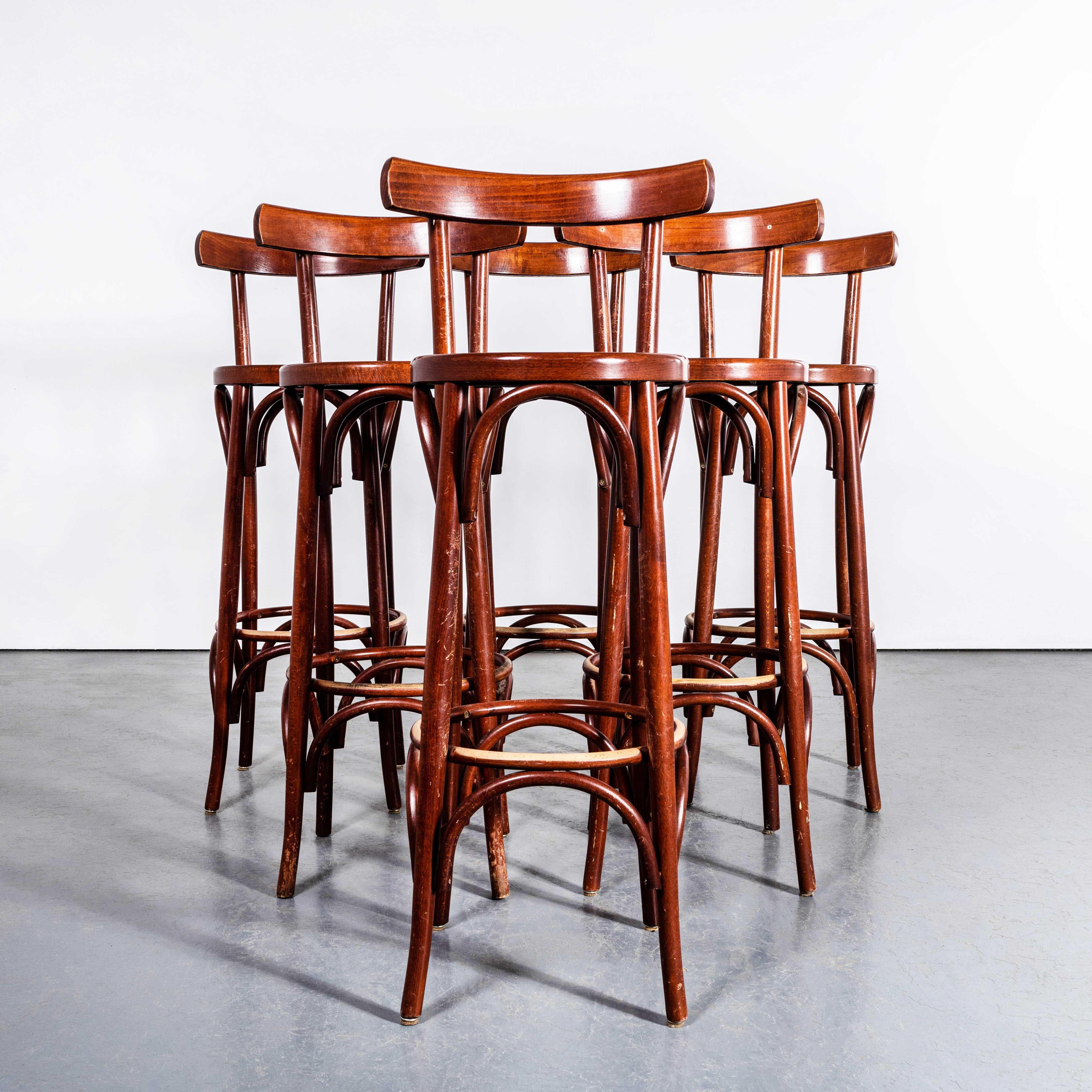 1960's Original Rich Oak Bar Back Bar Chairs - Set Of Six. 

Good quality set of six classic bentwood bar chairs in a rich warm oak colour. The stools were made in Eastern Europe using solid steam bent beech, they are in an attractive reddish hue