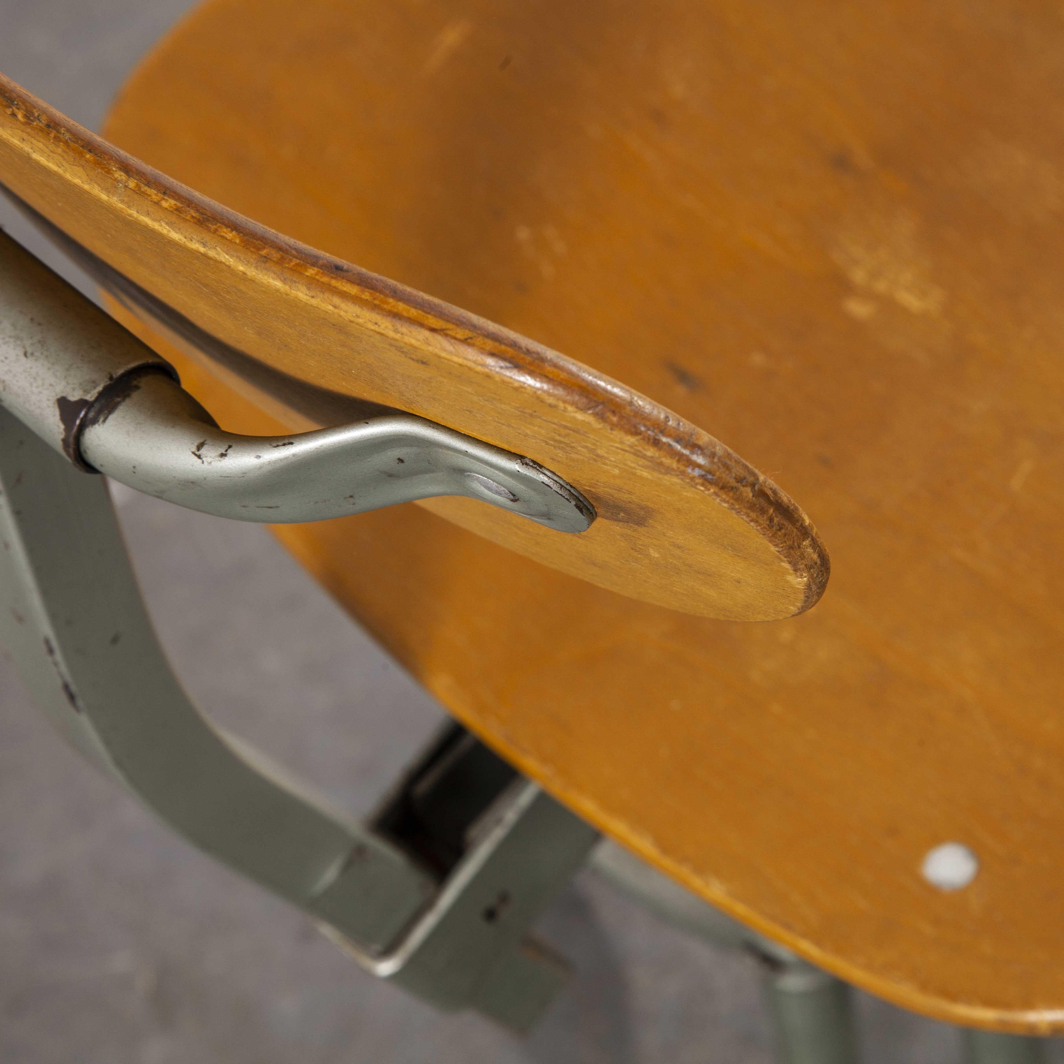 1960s original French Bienaise swiveling atelier - desk chair. The classic French industrial chair designed and made in France by the Nelson Brothers.
Back rest height dimensions are as photographed. Overall height maximum 90cm, height minimum