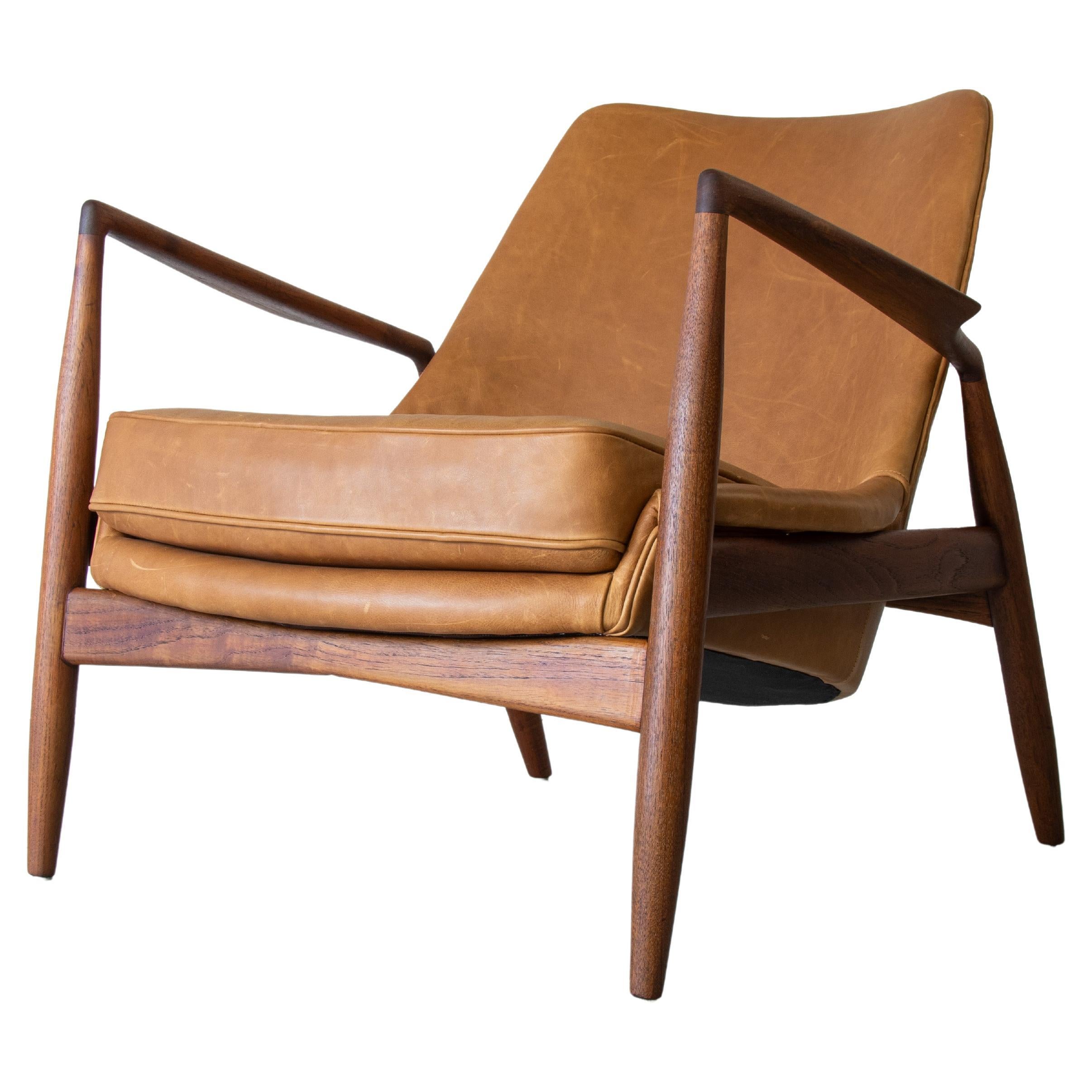 1960s Original Ib Kofod Larsen Seal Chair in Teak and Cognac Leather For Sale