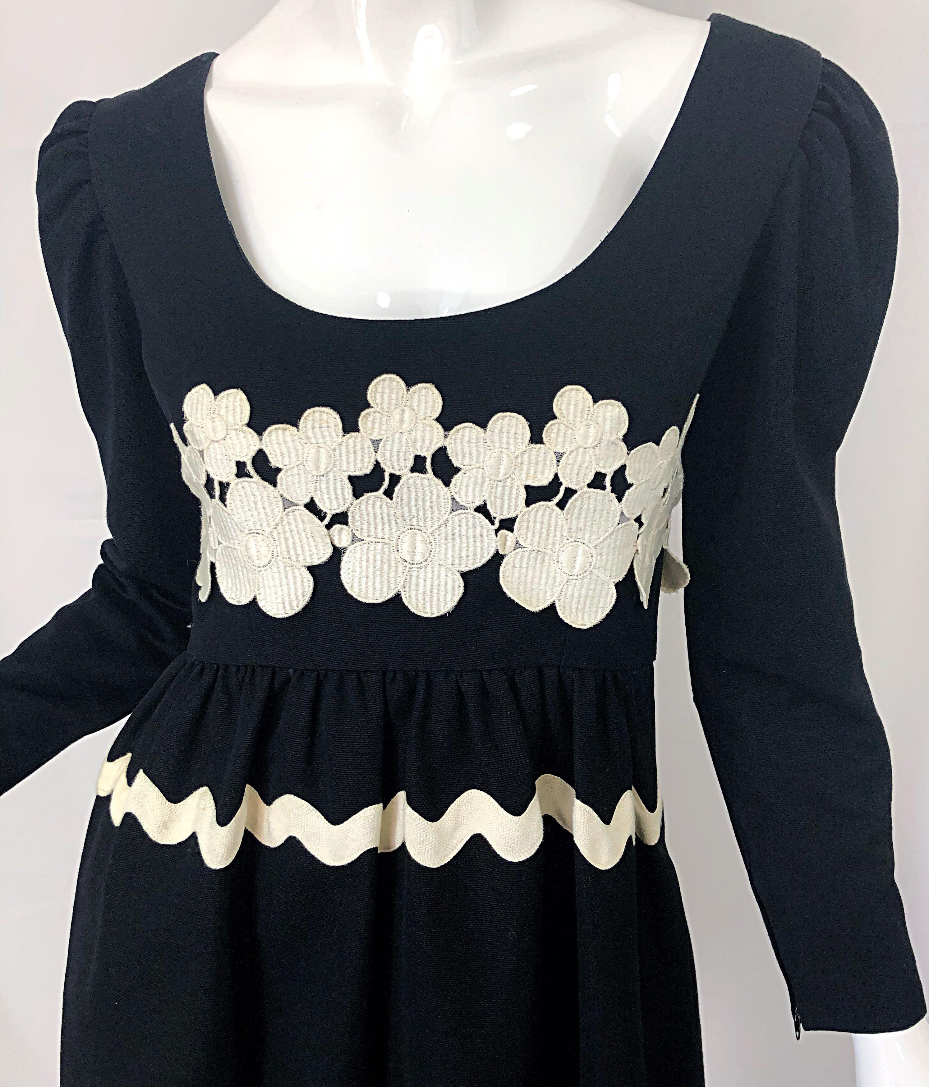 black dress with white embroidered flowers