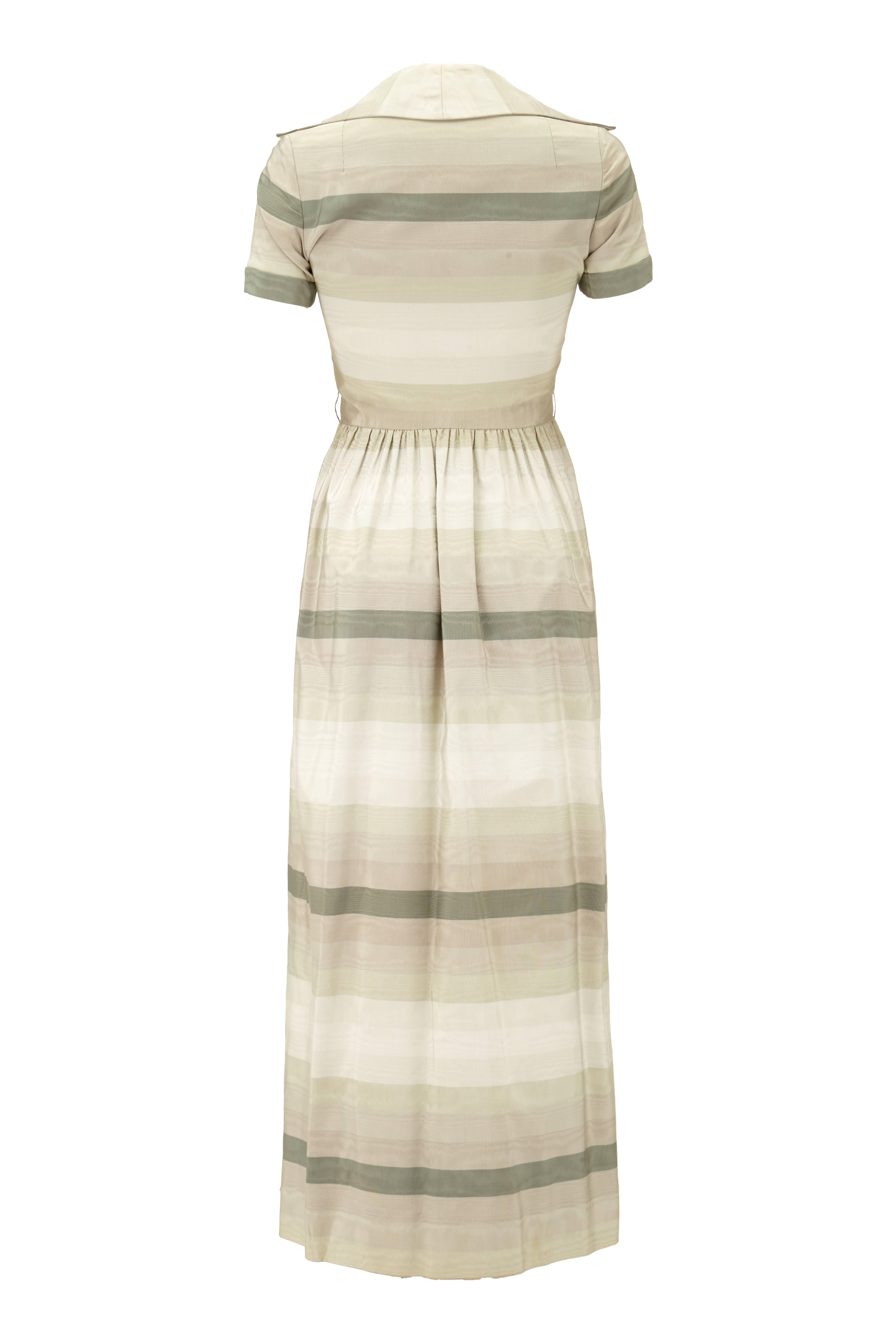 Fantastic heavy silk, long, shirt-waister dress with grey toned horizontal stripes by Oscar de la Renta. This vintage late 1960s pret-a-porter design was an early label for the designer after he branched out on his own having designed for the