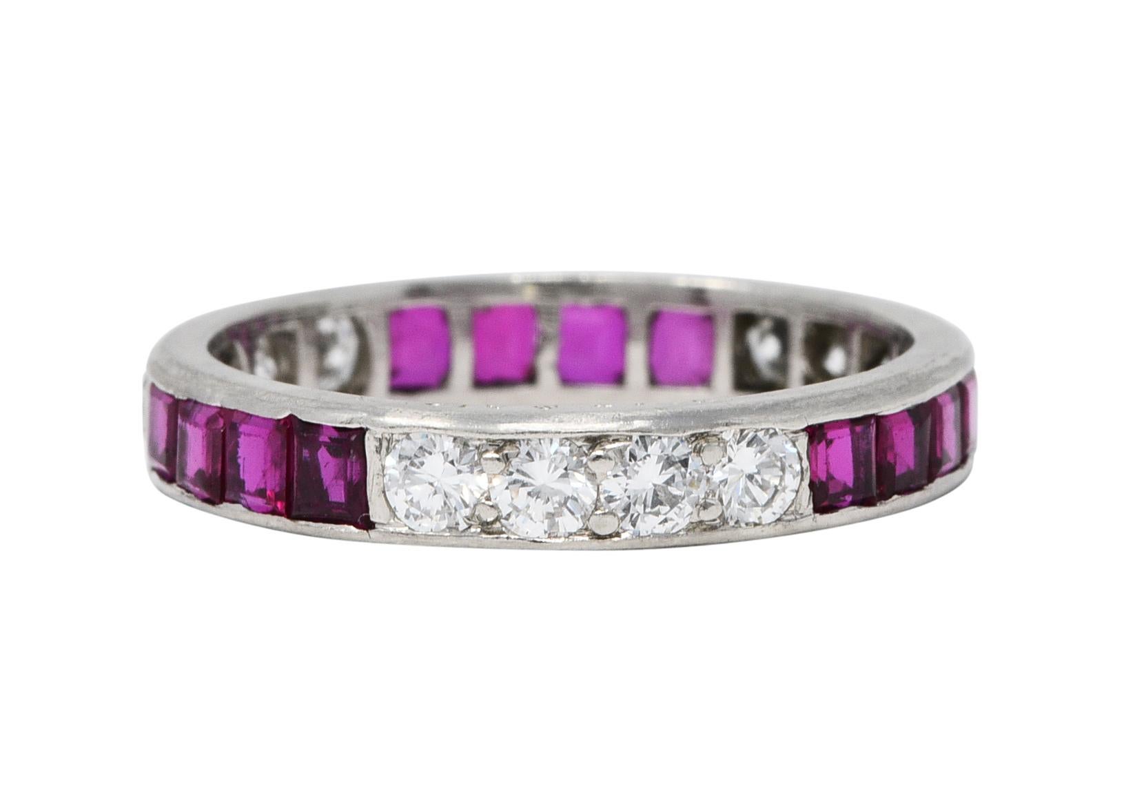 Eternity band ring features round brilliant diamonds alternating with square cut rubies

Diamonds are bead set while weighing in total approximately 0.72 carat - G to I color with SI clarity

Rubies are channel set while weighing in total