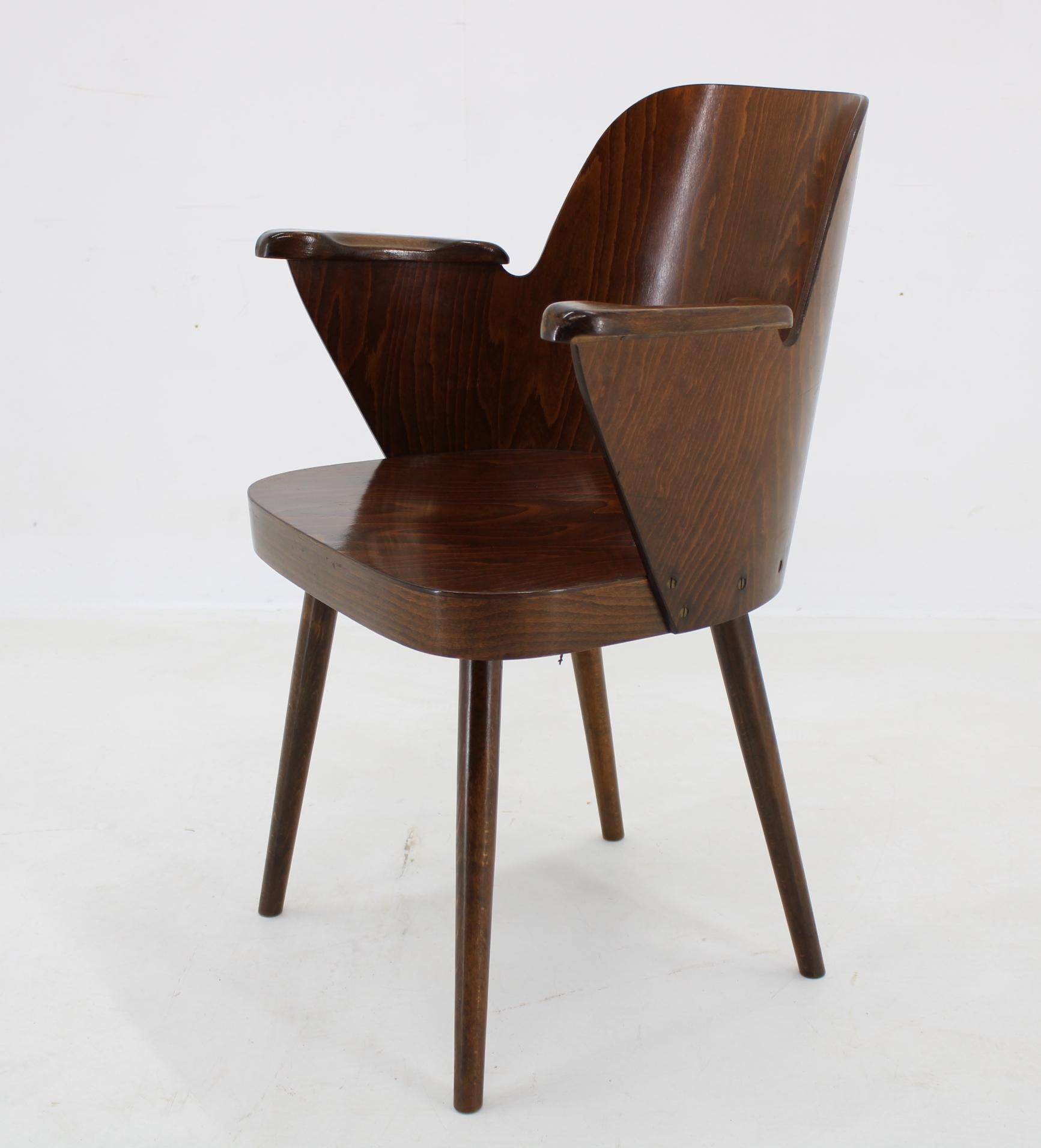 - Made of stained beech wood and beech plywood 
- The wooden parts have been repolished
- Height of armrests: 64 cm