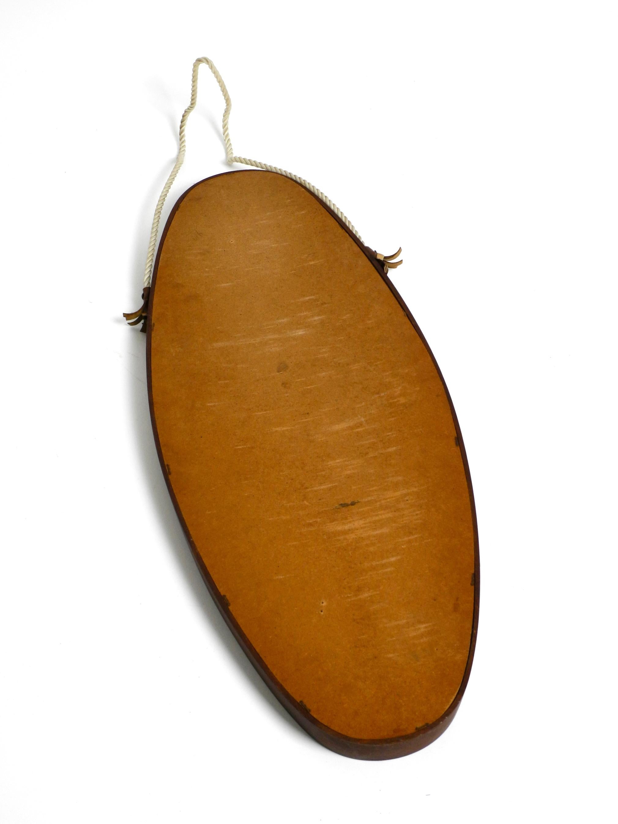 1960s oval large teak wall mirror with thick nylon rope  Made in Italy For Sale 4