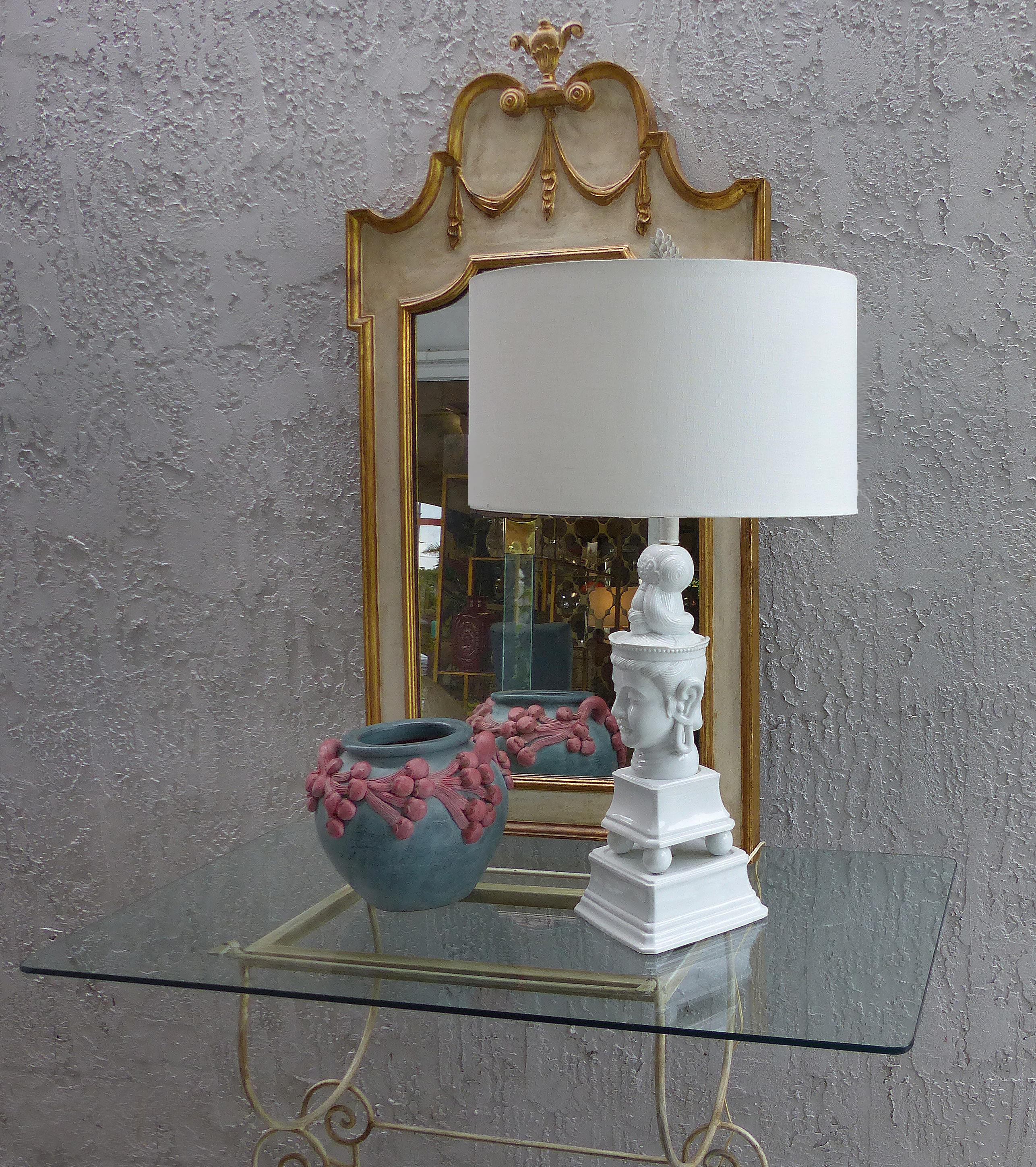 1960s Overscale Blanc de Chine Buddha Table Lamp

Offered for sale is a rare overscaled 1960s Blanc de Chine porcelain Buddha lamp with great details. The lamp is completed with a finial appropriate to the far east style. The lamp is now being