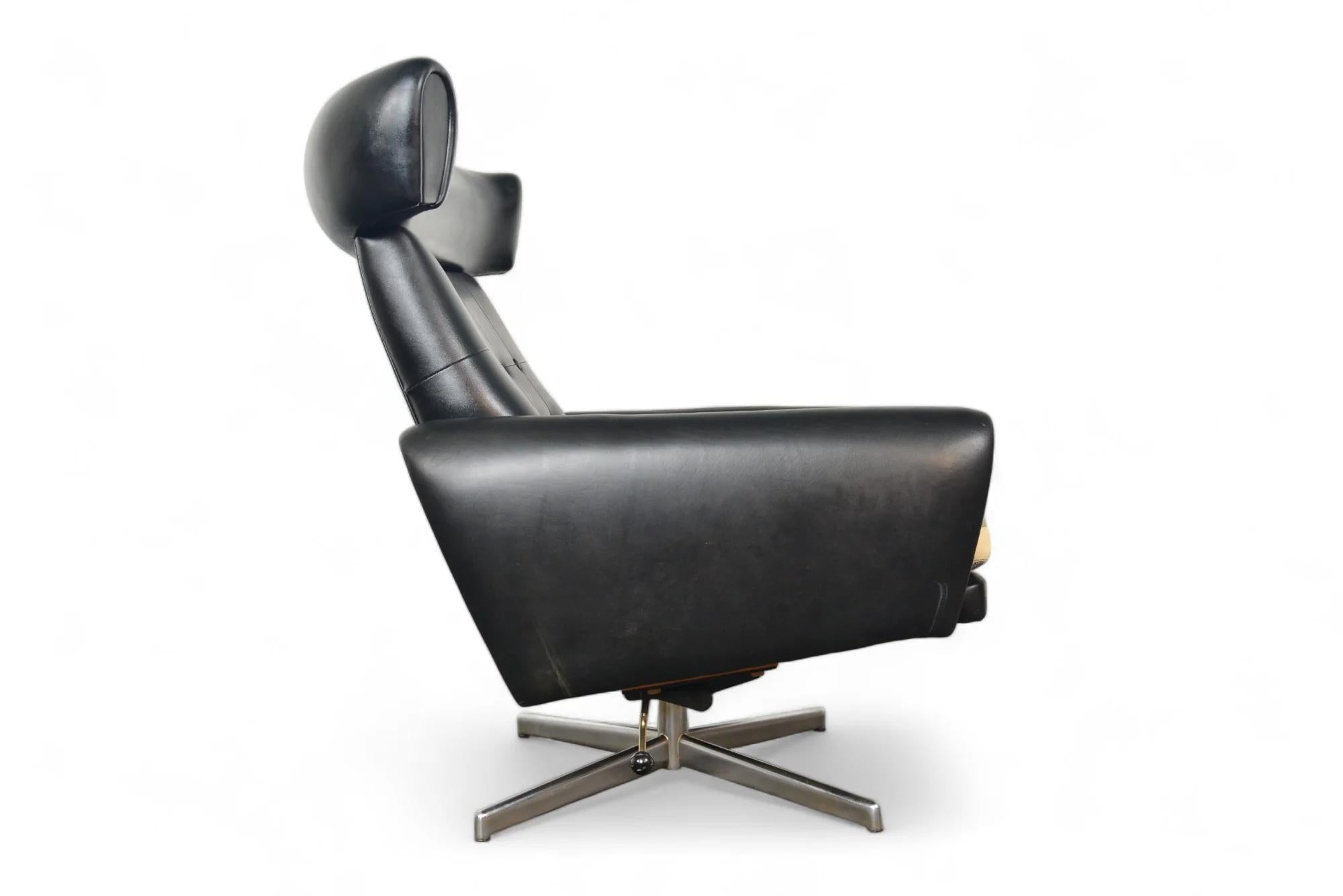 Danish 1960s Ox Style Wingback Swivel Lounge In Black Vinyl For Sale