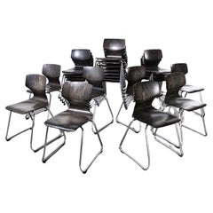 Ensemble de vingt-quatre chaises de salle à manger Pagholz en noyer foncé des années 1960, pieds chromés