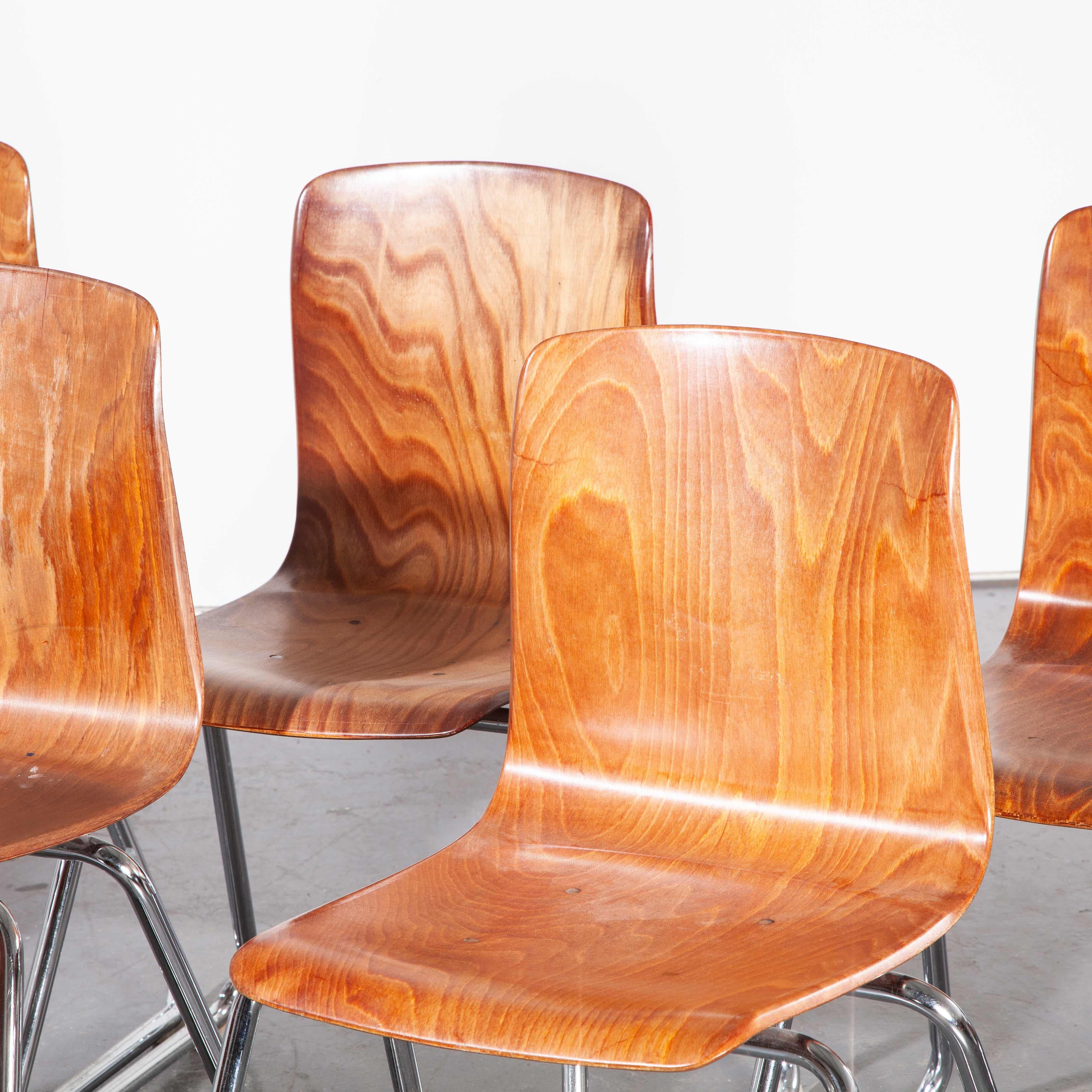 1960s Pagholz dining chairs made in laminated hardwood with chrome legs, set of six, light walnut. Pagholz is an interesting West German company that perfected the manufacturing technique to make laminated furniture with complex multiple shapes.