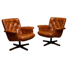Vintage 1960s Pair Cognac Leather EVA Swivel Chairs Göte Nassjö. 