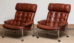1960s Pair Easy / Armchairs in Chrome and Aged Brown /Cognac Leather by Lindlöfs