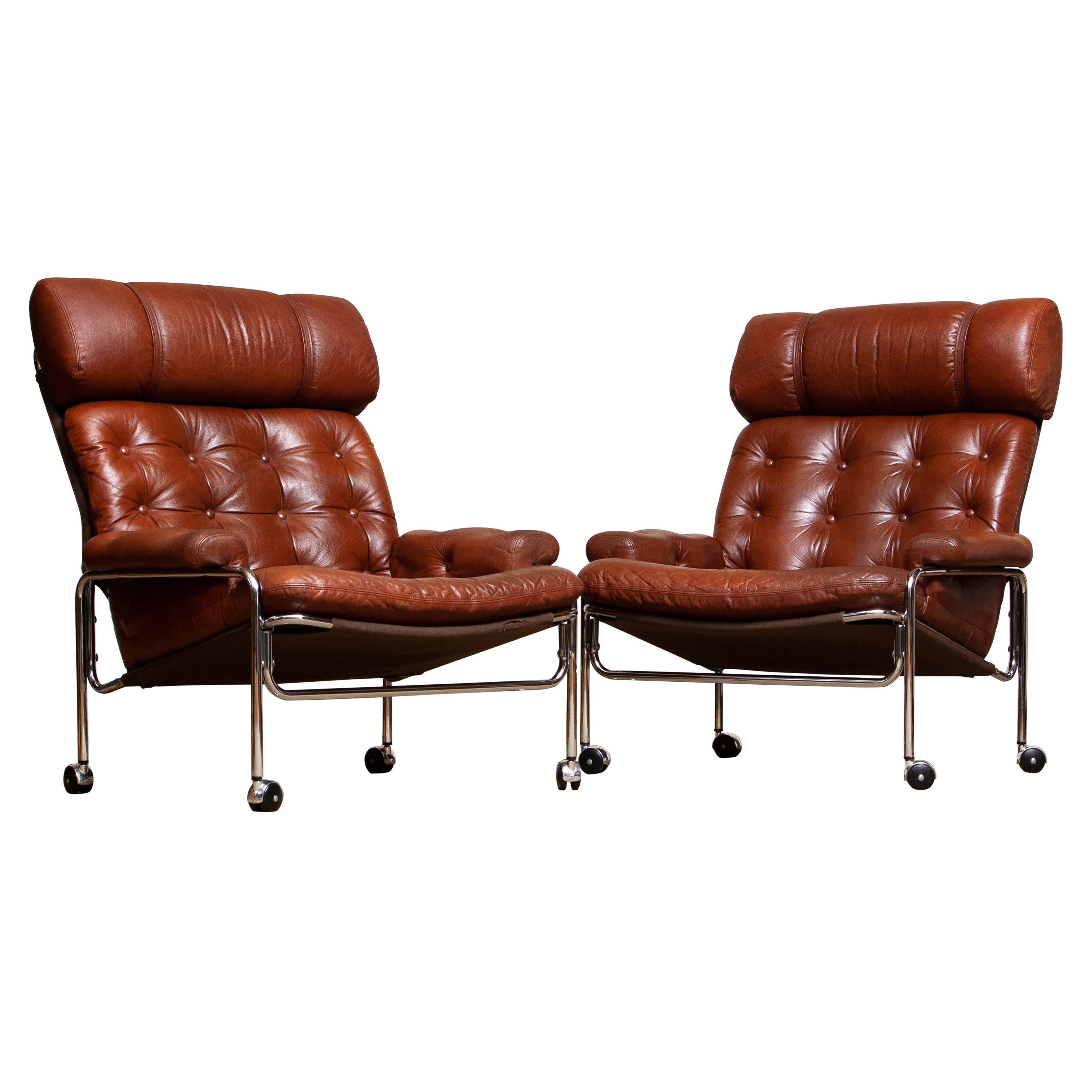 Mid-Century Modern 1960s Pair Easy / Armchairs in Chrome and Aged Brown /Cognac Leather by Lindlöfs