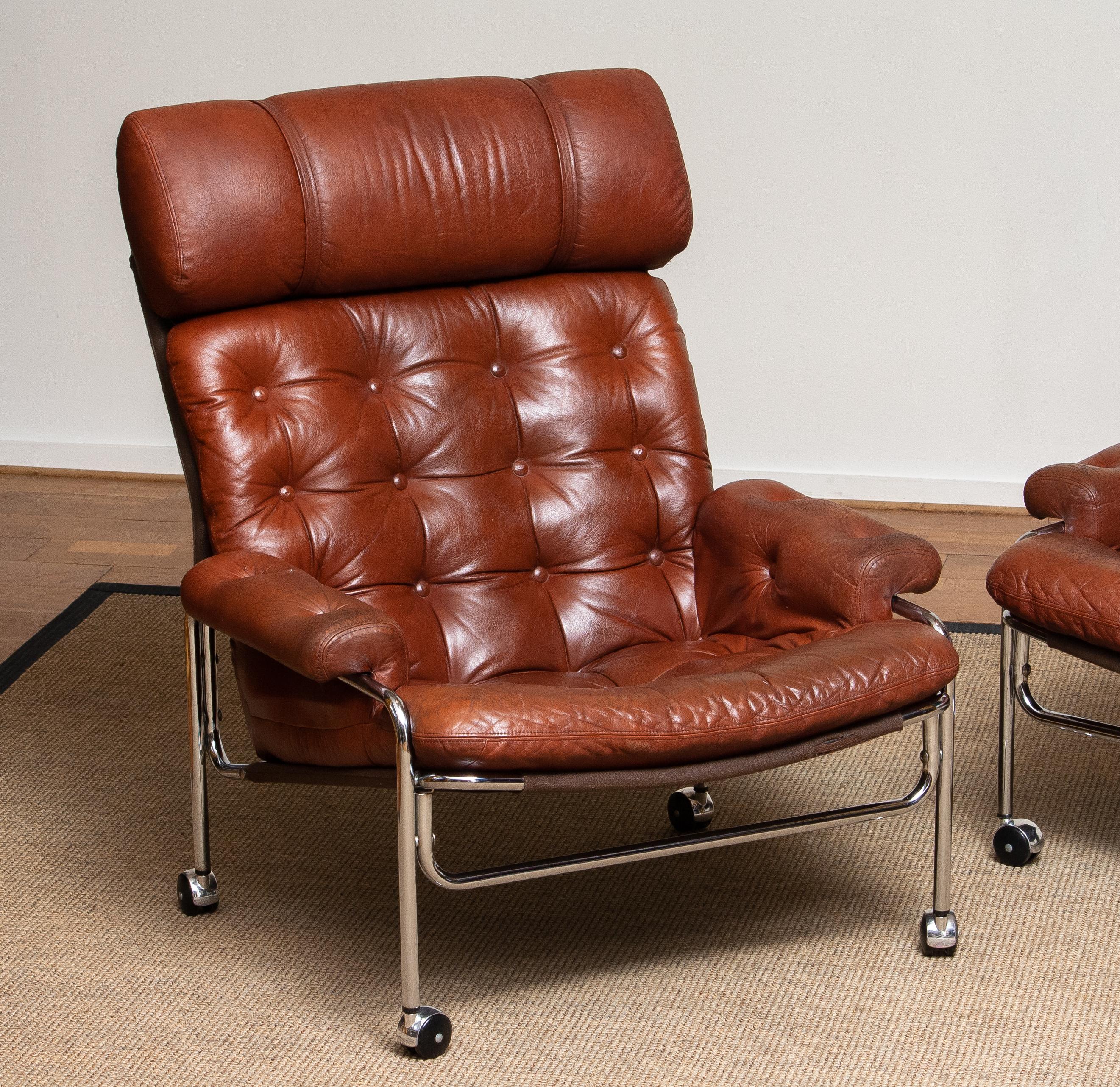 Mid-20th Century 1960s Pair Easy / Armchairs in Chrome and Aged Brown /Cognac Leather by Lindlöfs