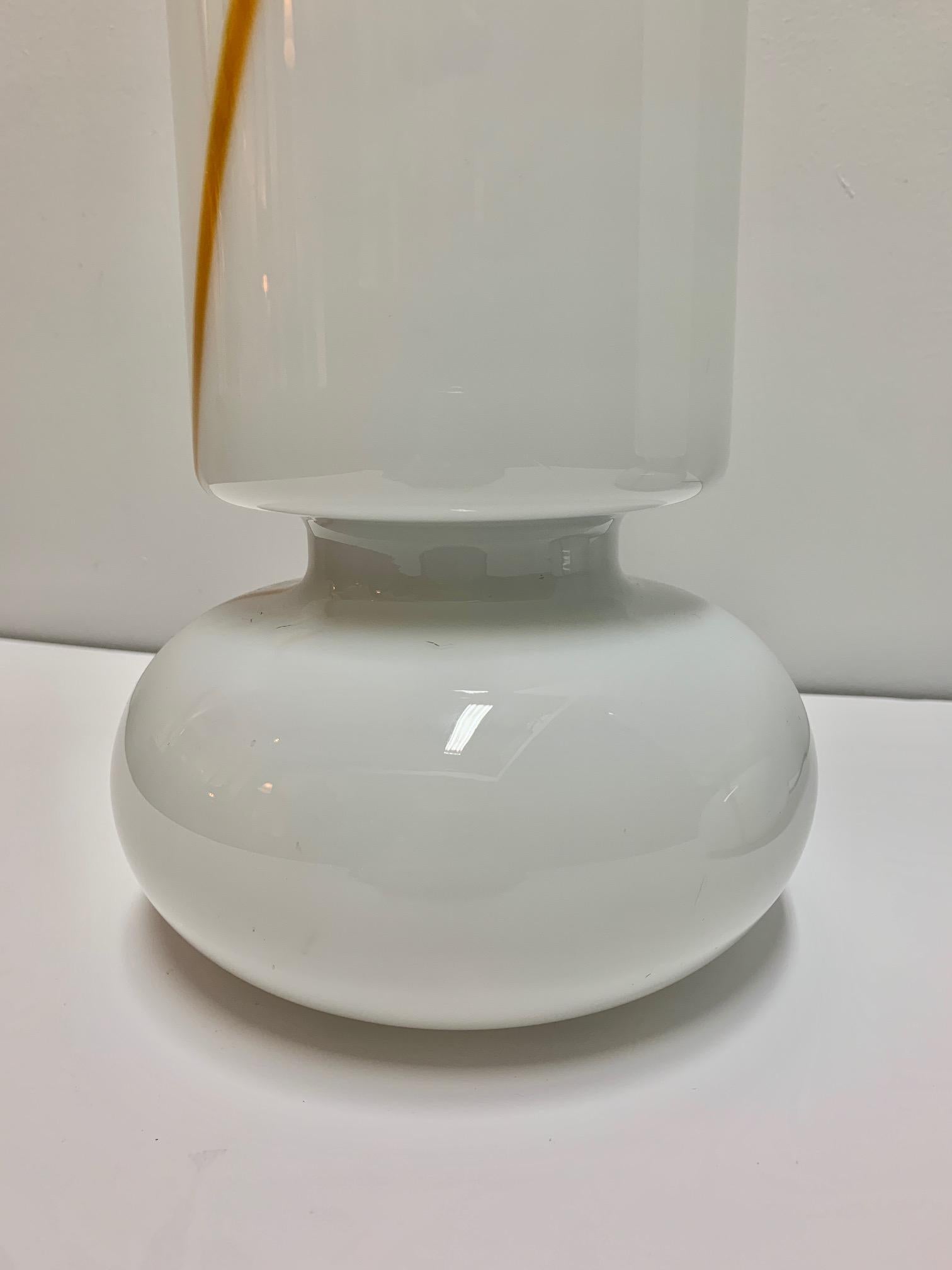 Pair of table lamps, white opaline and Murano glass, a single blown piece with a transverse stripe in caramel color, with two light points at the bottom and another at the top.