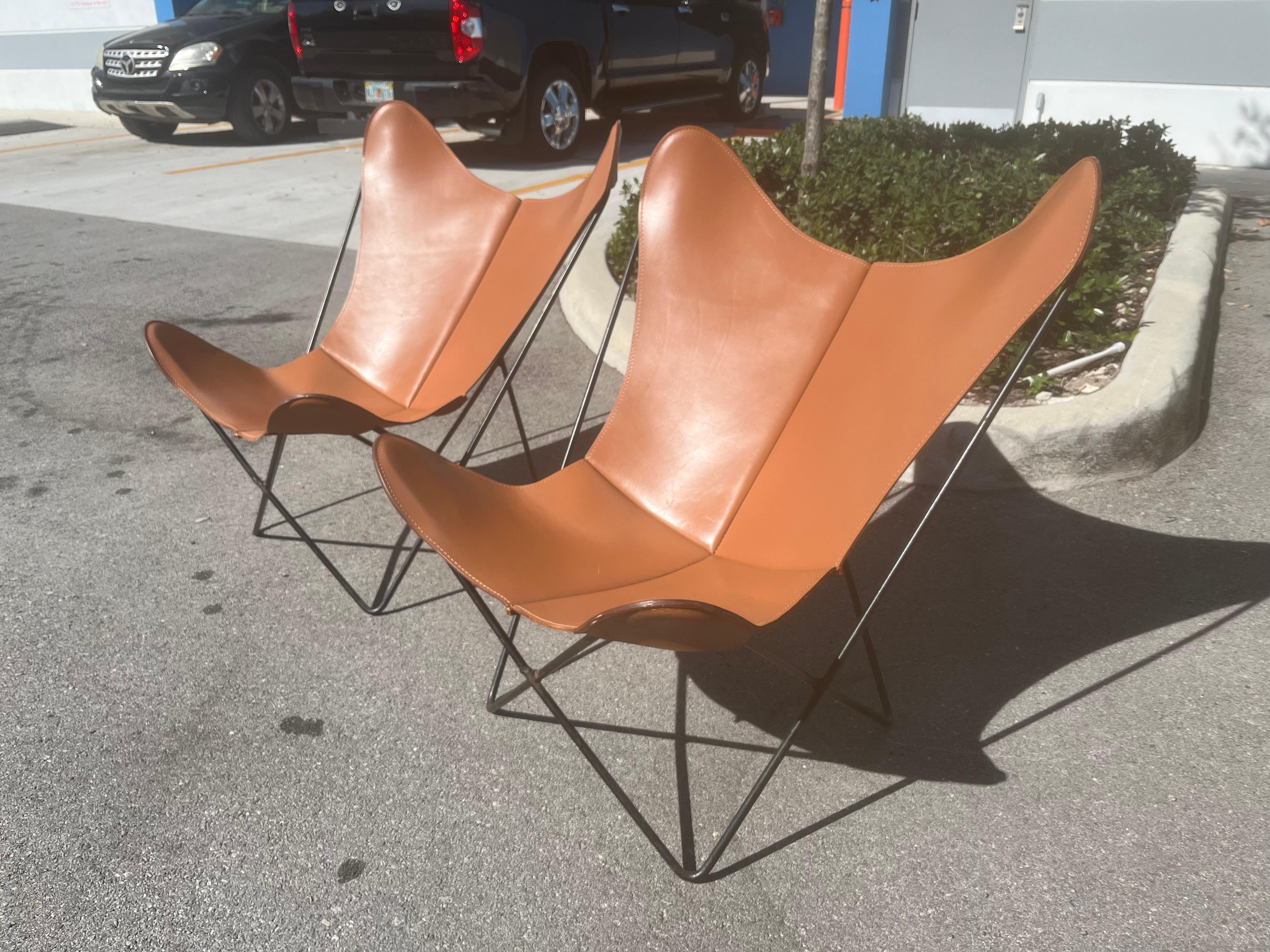 Beautiful Pair of Leather Butterfly Chairs by Jorge Ferrari Hardoy Bonet and Kurchan. All original vintage condition, base finish and leather original from the 1960s. Great condition, no damages, just normal wear. Leather is still very strong. 

