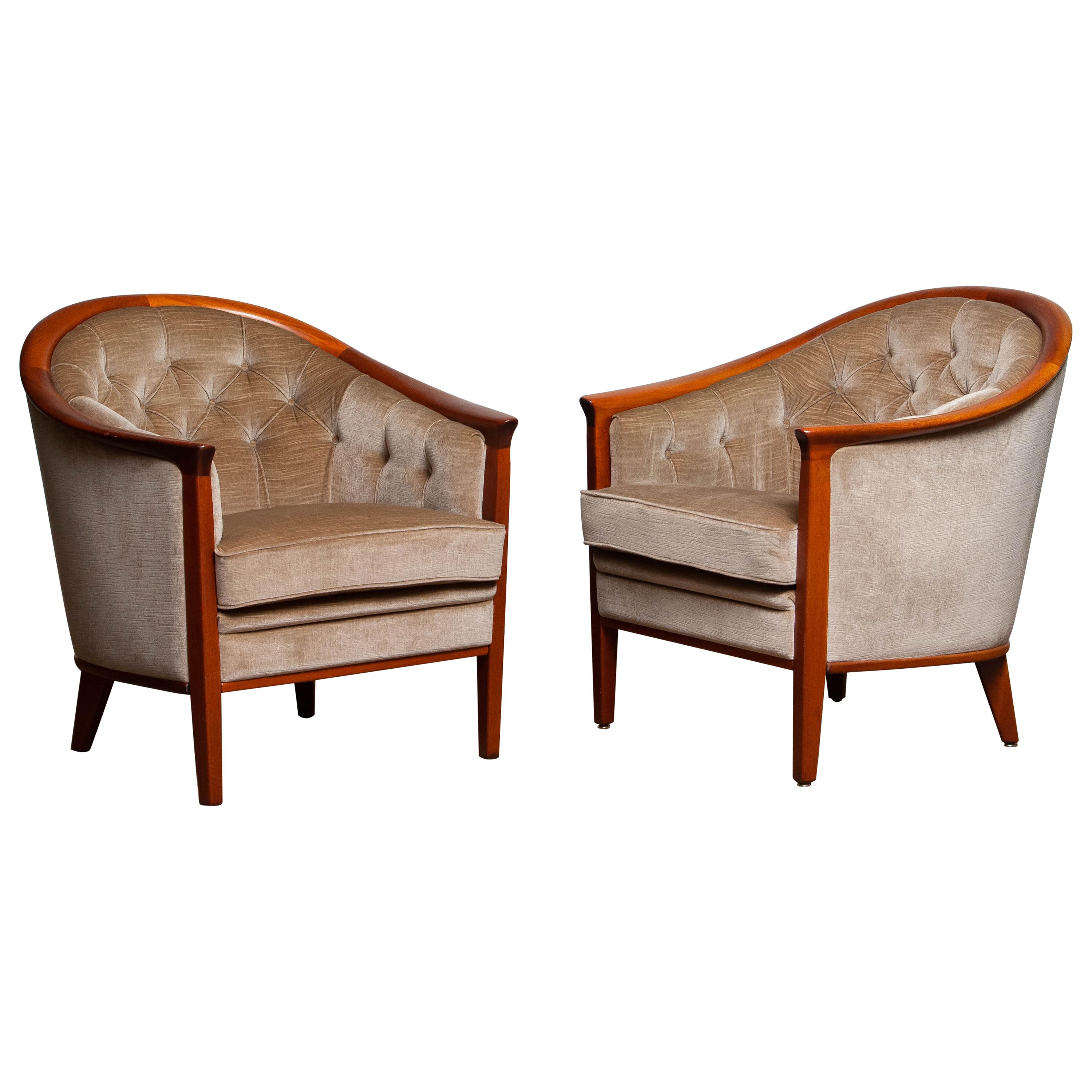 Beautiful set of two Scandinavian 'model Aristokrat'   padded taupe velvet lounge chairs designed by Bertil Fridhagen for Broderna Andersson / Broderna Anderssons Industrier Ekenässjön AB Sweden.
These high quality lounge chairs are overall in very