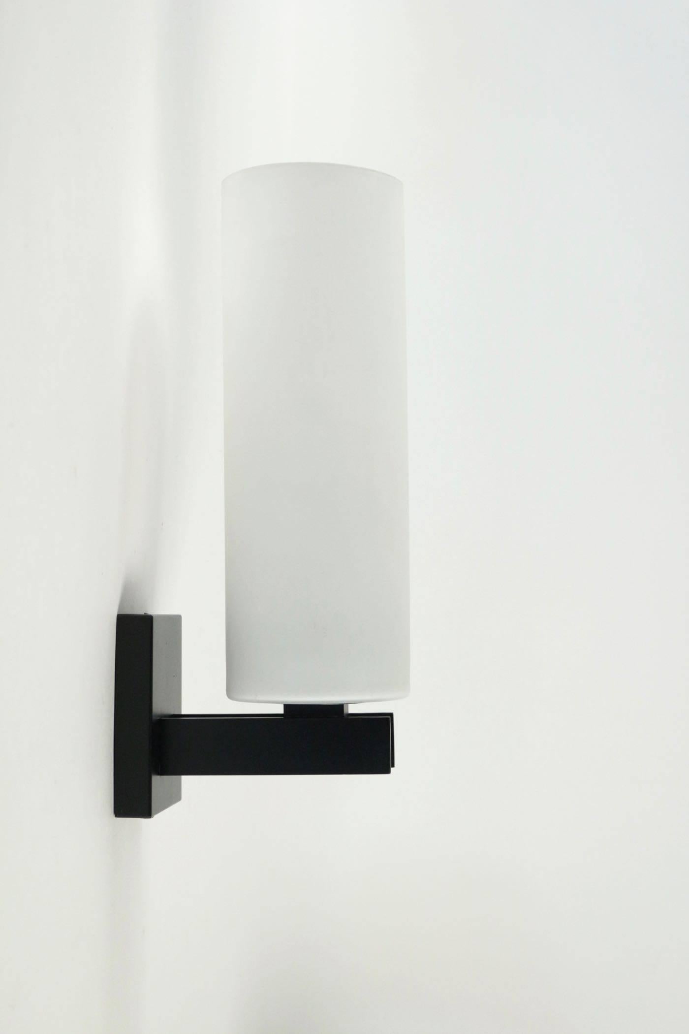 Mid-20th Century 1960s Pair of Blackened Steel Sconces with White Satin Glass Shades