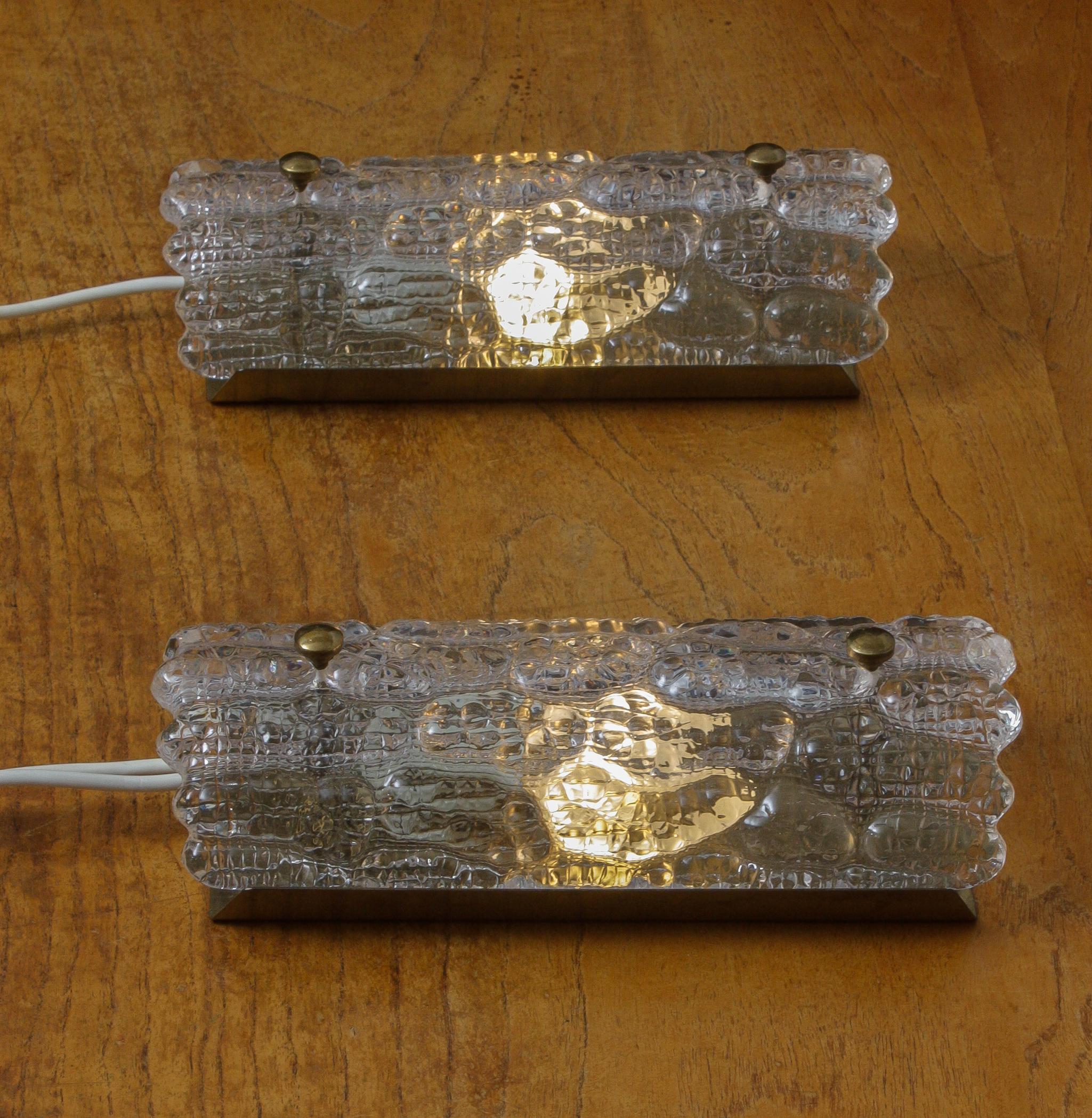 Mid-20th Century 1960s, Pair of Brass and Crystal Wall Lights by Carl Fagerlund for Orrefors For Sale