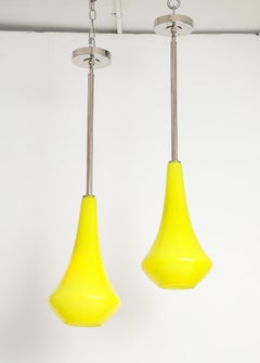 1960's Pair of Canary Yellow Glass Pendant lights.